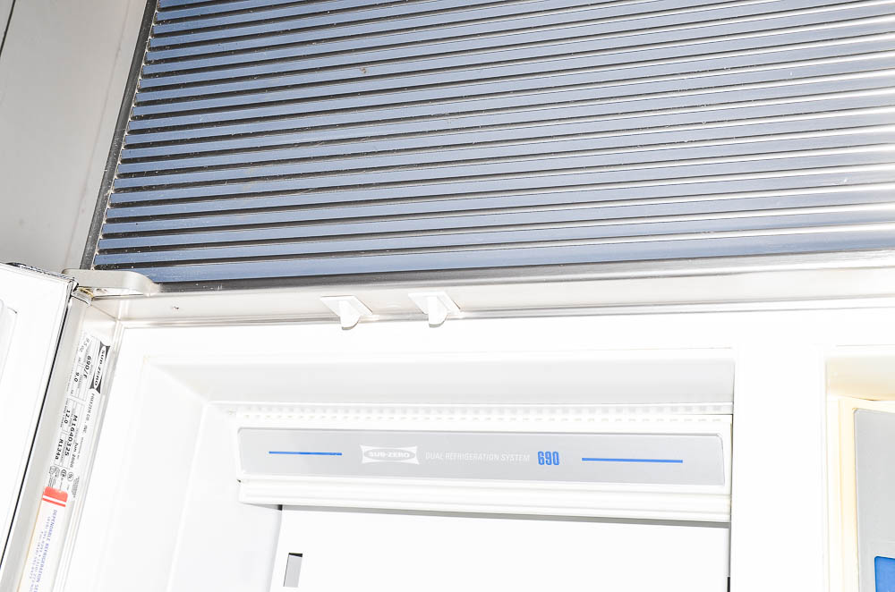 Sub-Zero 690/F Refrigerator with Wood Paneling