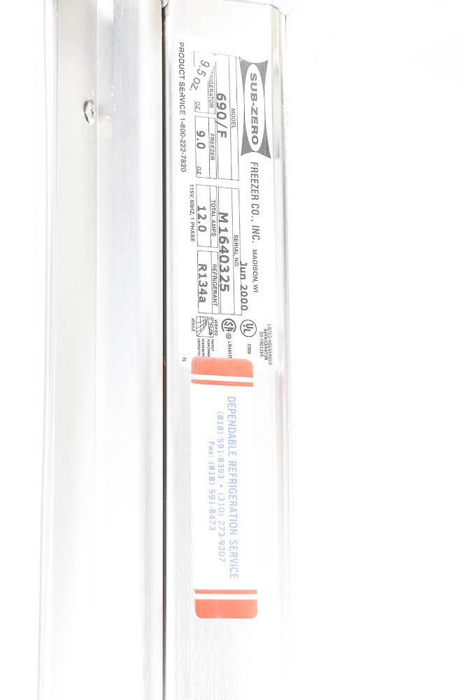 Sub-Zero 690/F Refrigerator with Wood Paneling