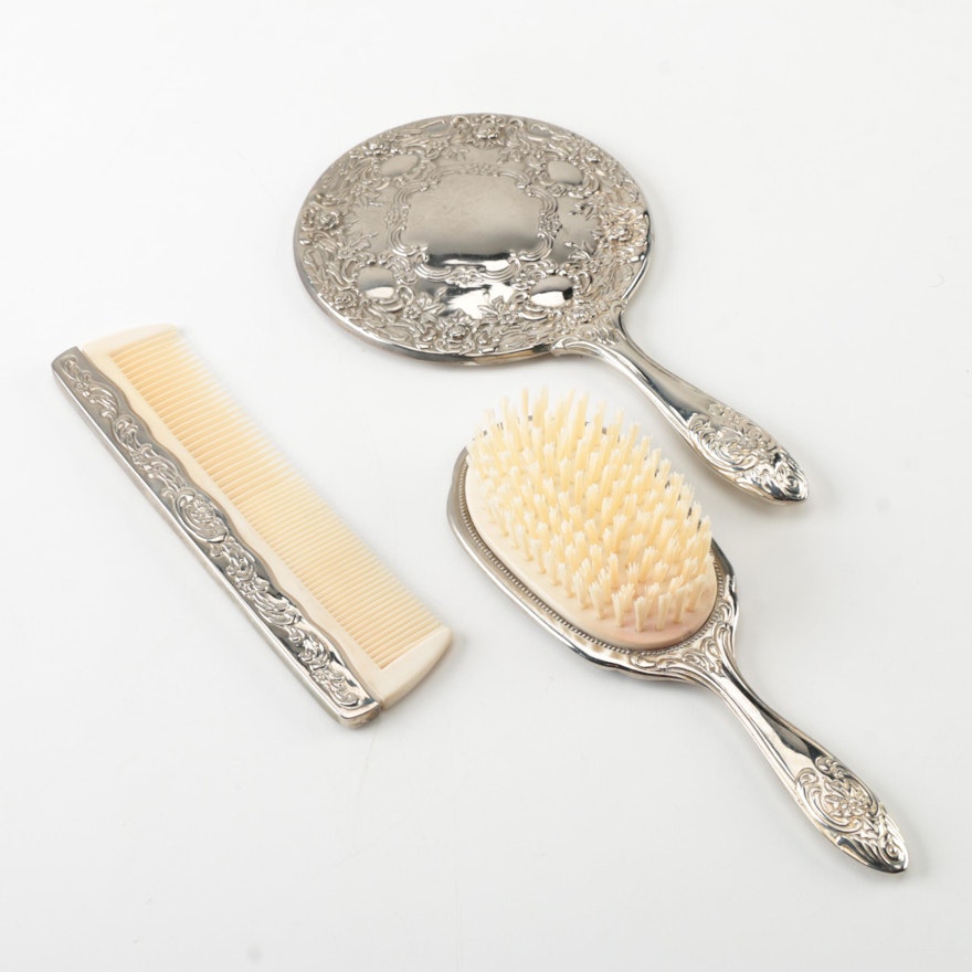 Vintage Silver-Tone Vanity Set Featuring Hand Mirror, Hairbrush, and Comb