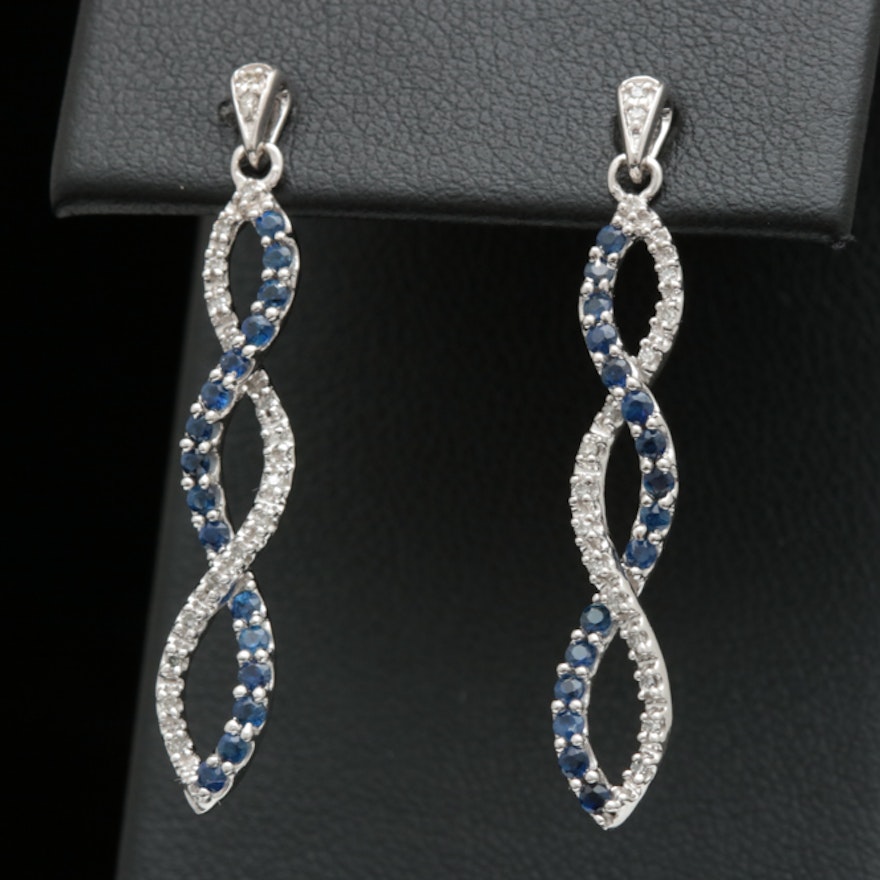 10K White Gold, Blue Sapphire and Diamond Dangle Earrings.