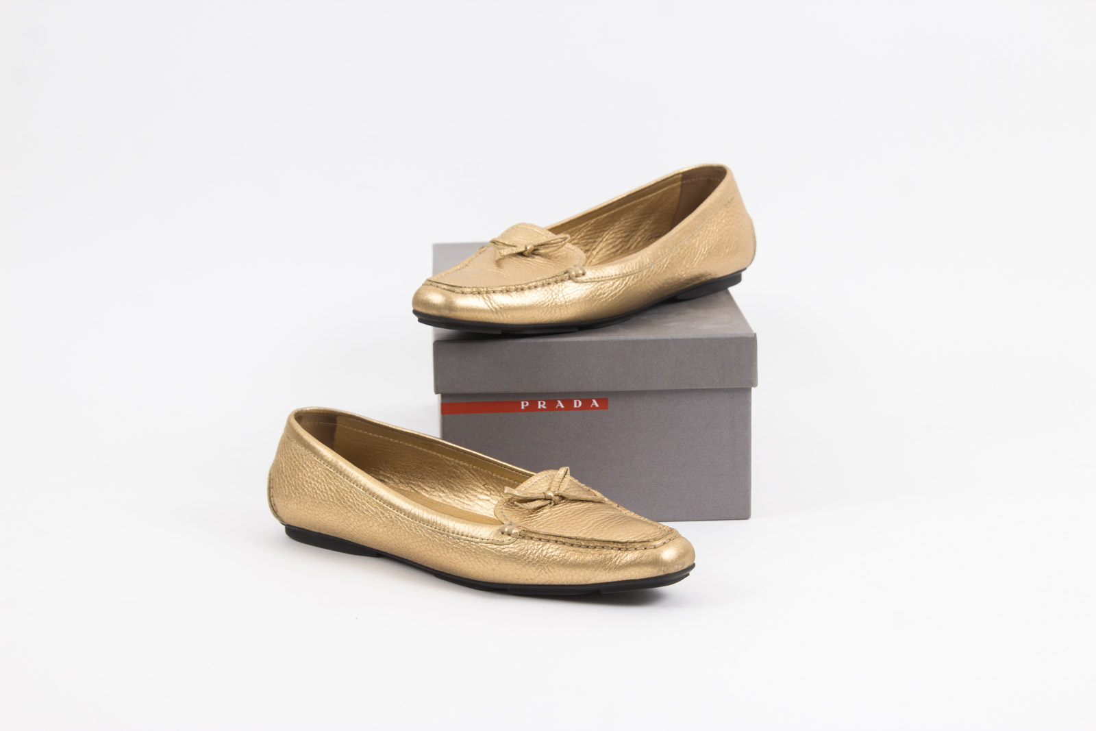 Prada Metallic Gold Tone Loafers