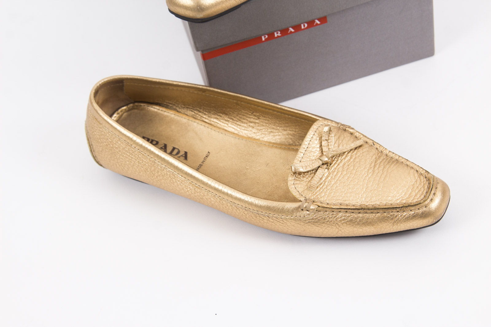 Prada Metallic Gold Tone Loafers