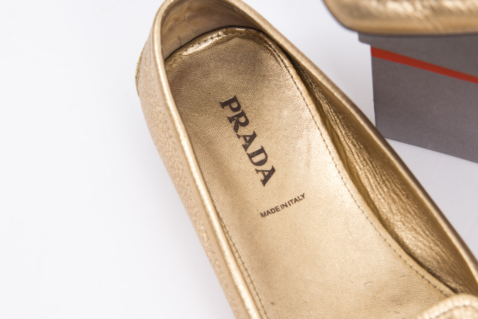 Prada Metallic Gold Tone Loafers