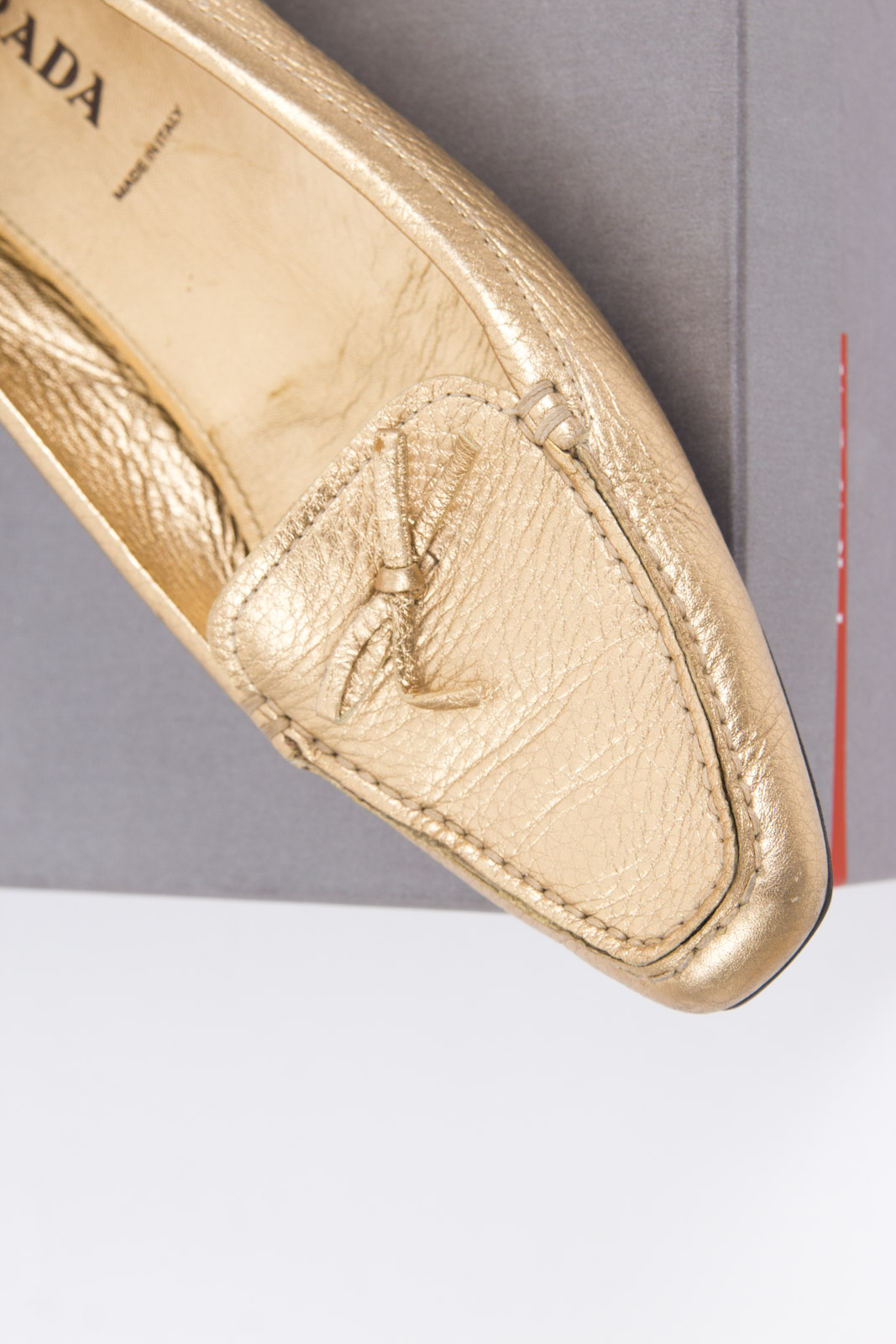 Prada Metallic Gold Tone Loafers