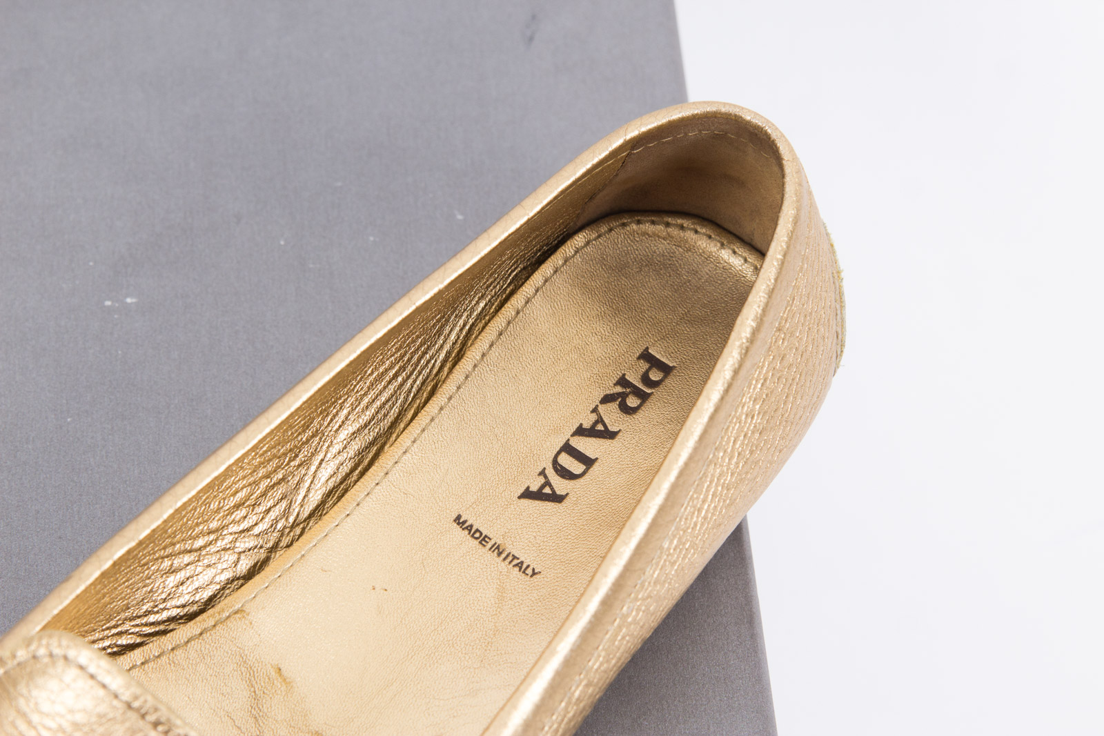 Prada Metallic Gold Tone Loafers