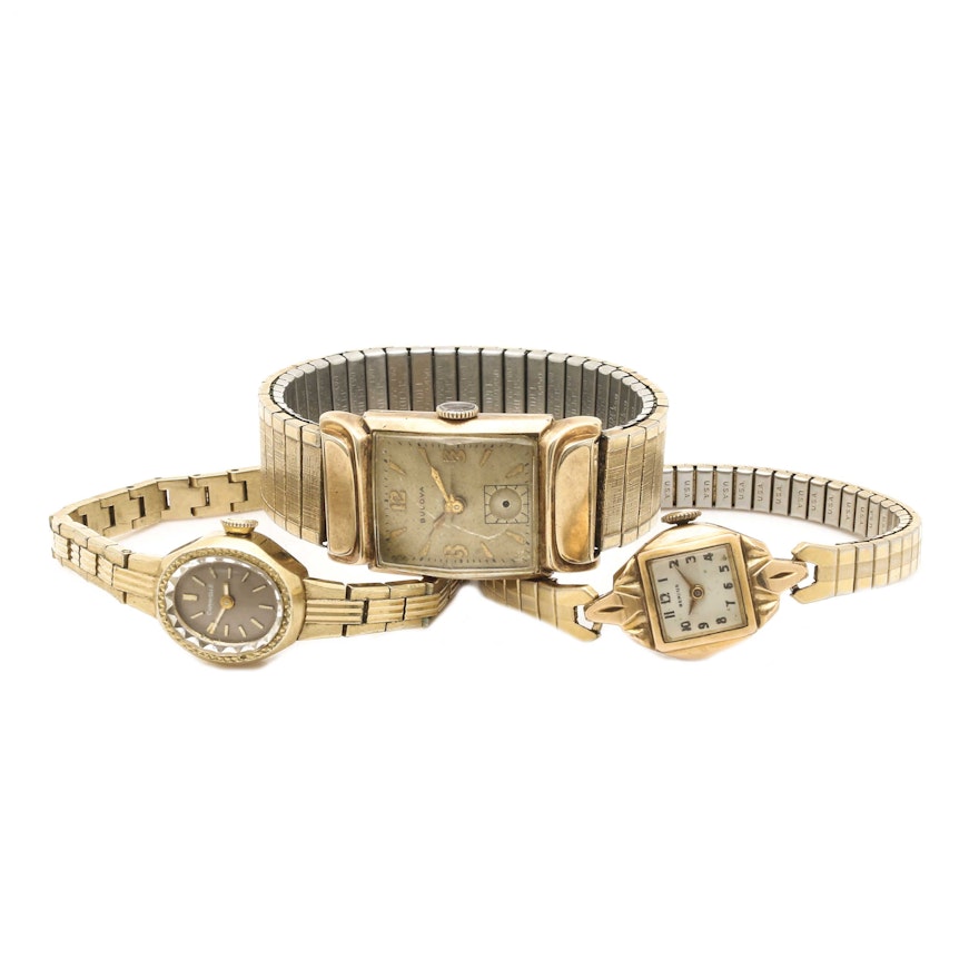 Gold Tone Analog Wristwatches Including Bulova