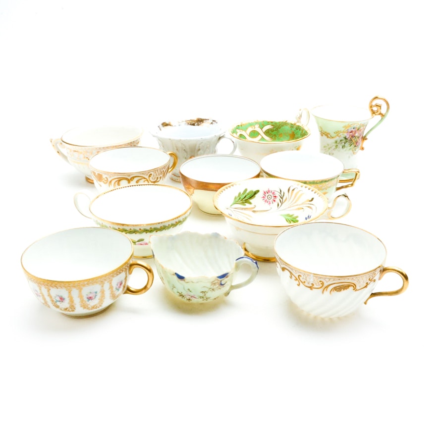 Assortment of Antique Porcelain Teacups including Limoges