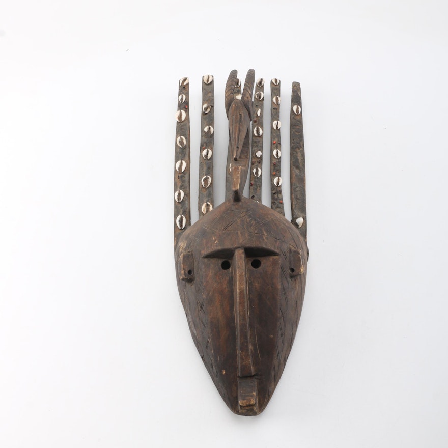 Bamana Carved Wood N'tomo Mask with Cowrie Shell and Bean Accents