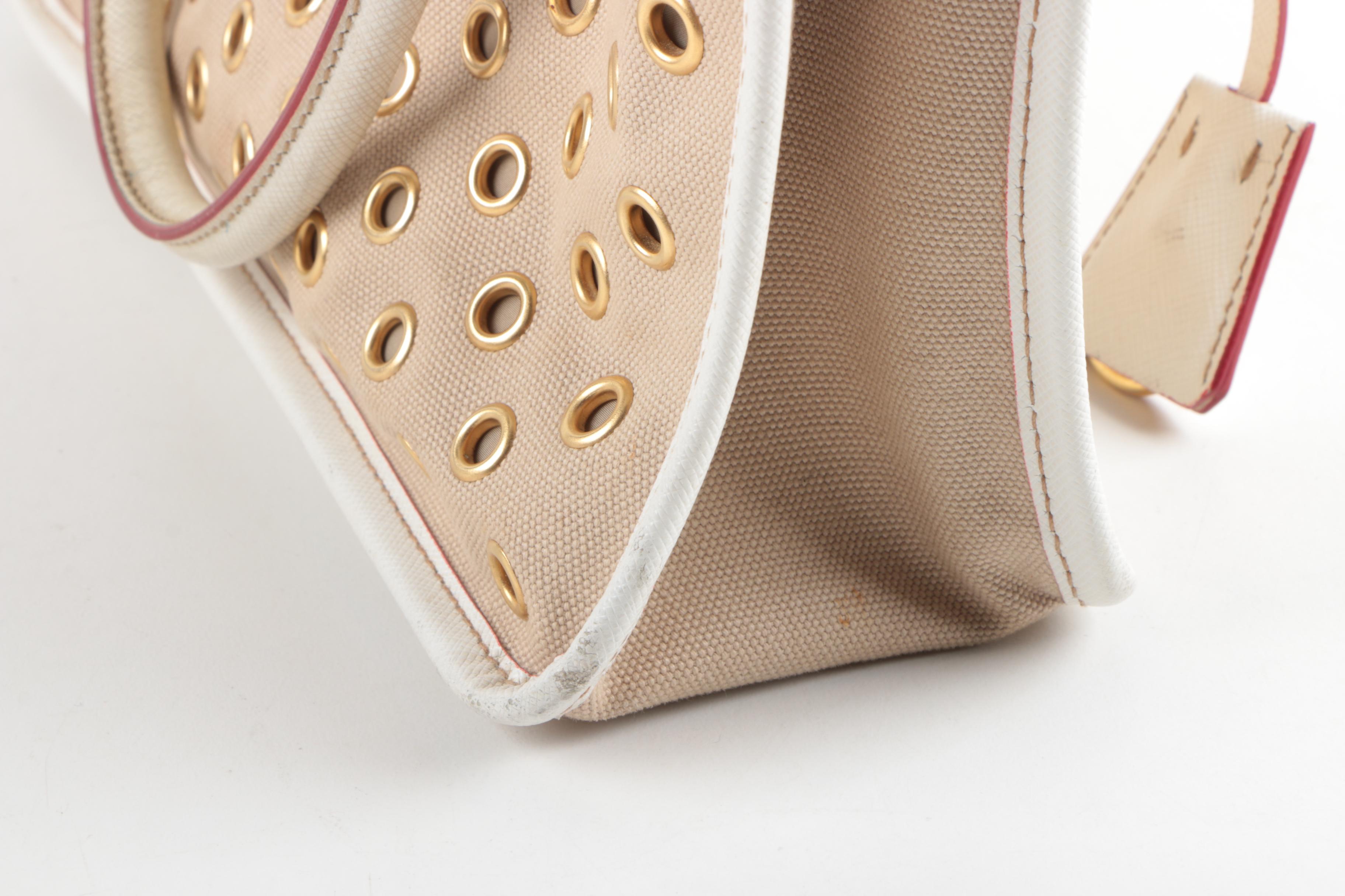 Prada Canvas and Leather Grommet Accent Handbag