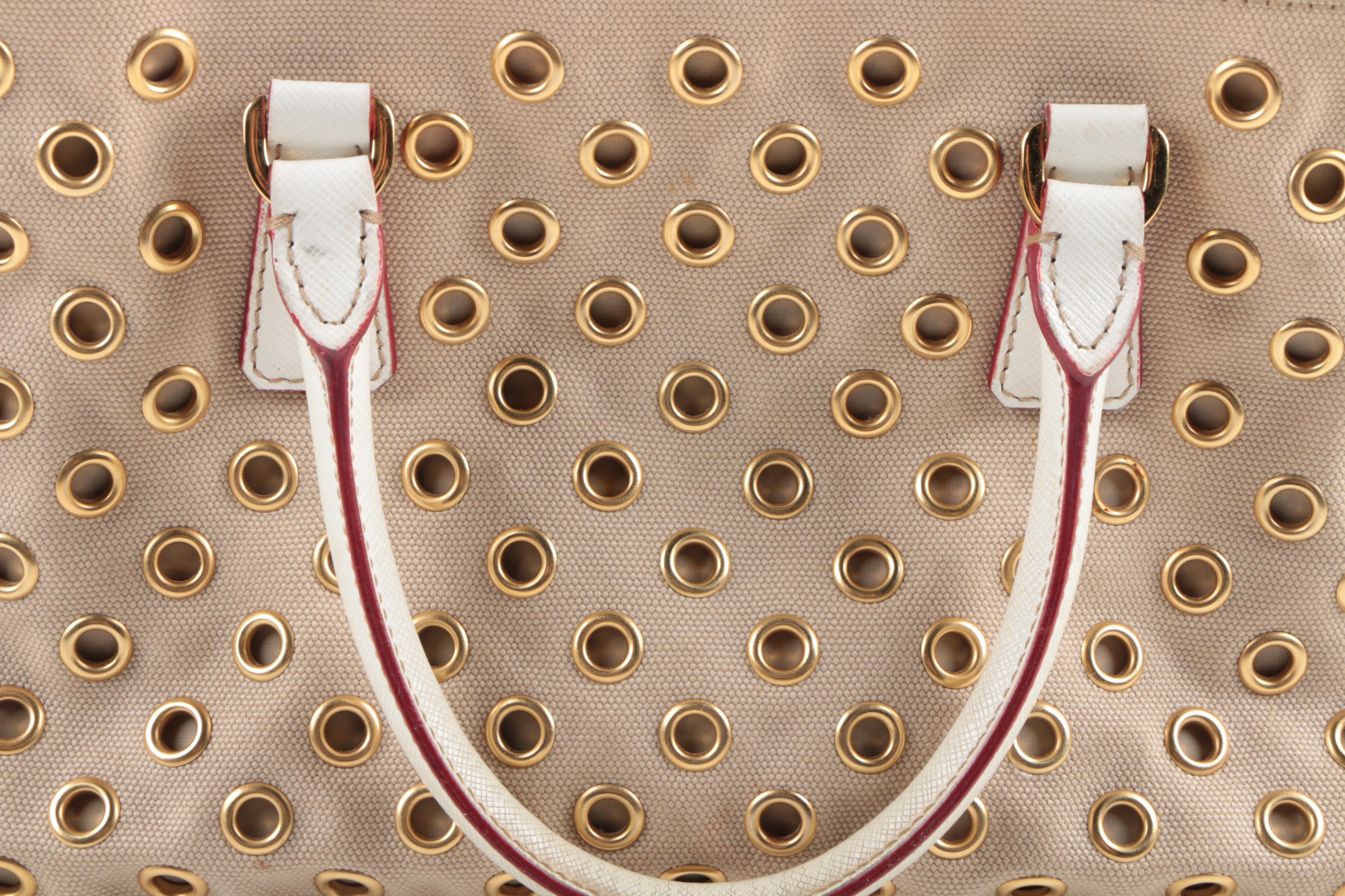 Prada Canvas and Leather Grommet Accent Handbag