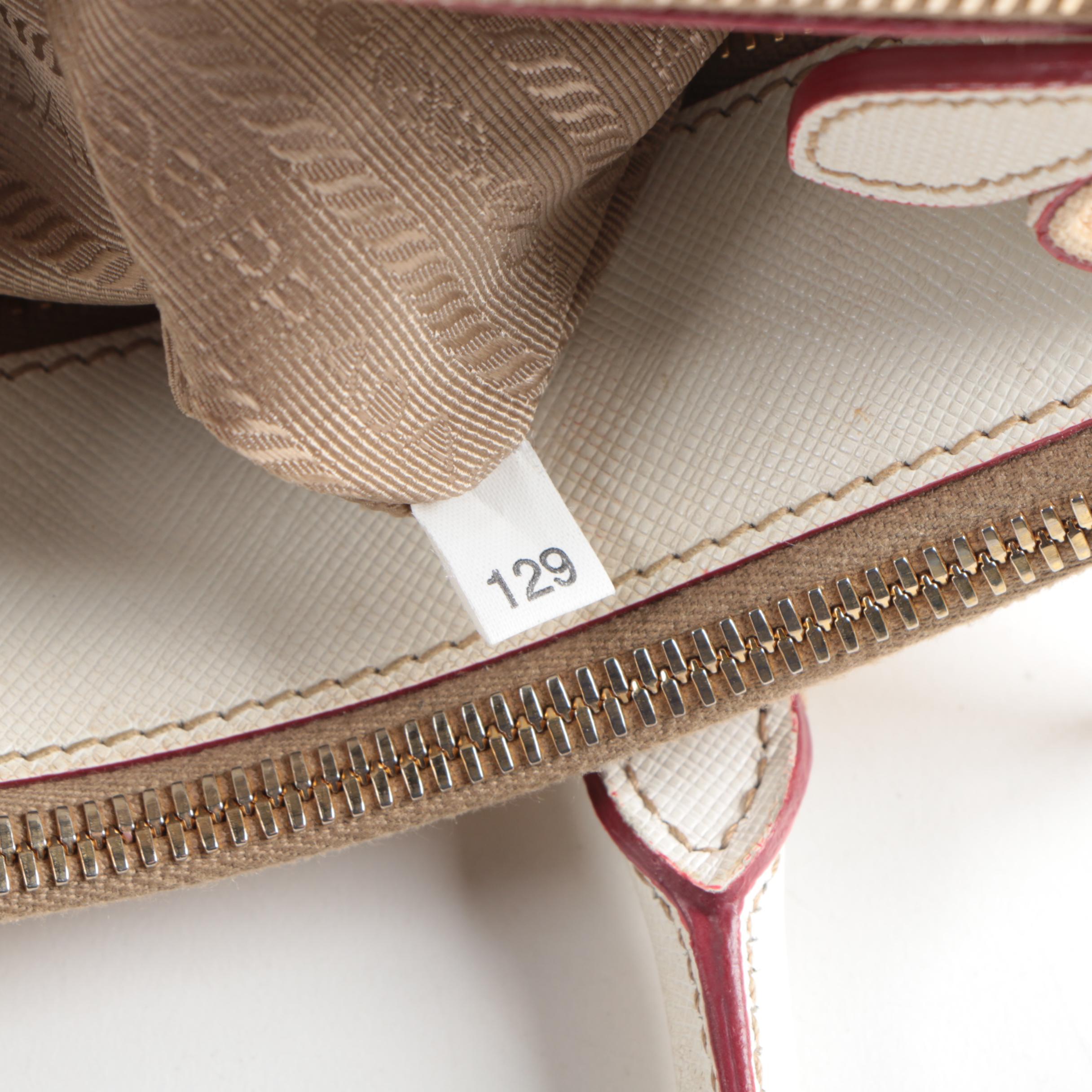 Prada Canvas and Leather Grommet Accent Handbag