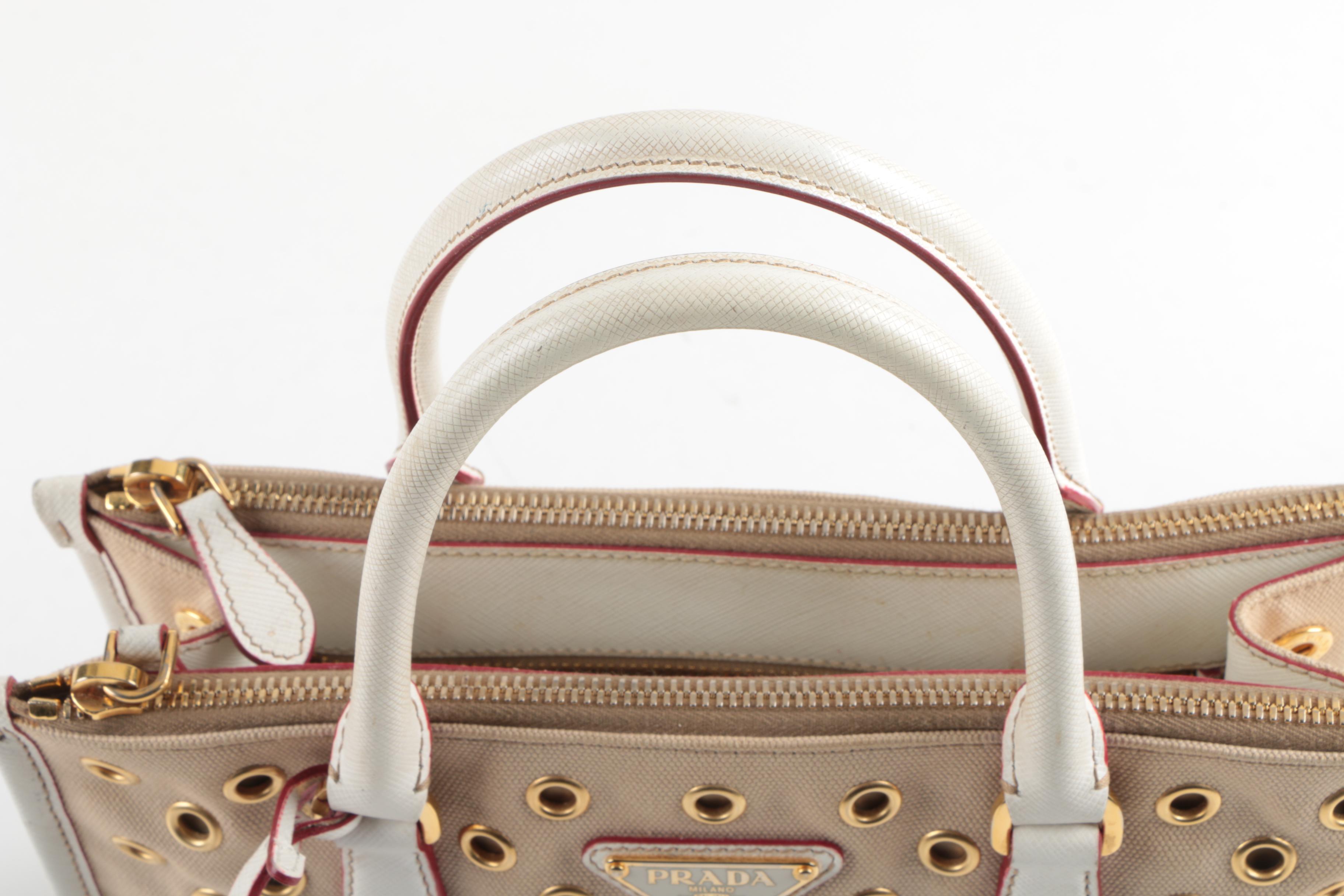 Prada Canvas and Leather Grommet Accent Handbag