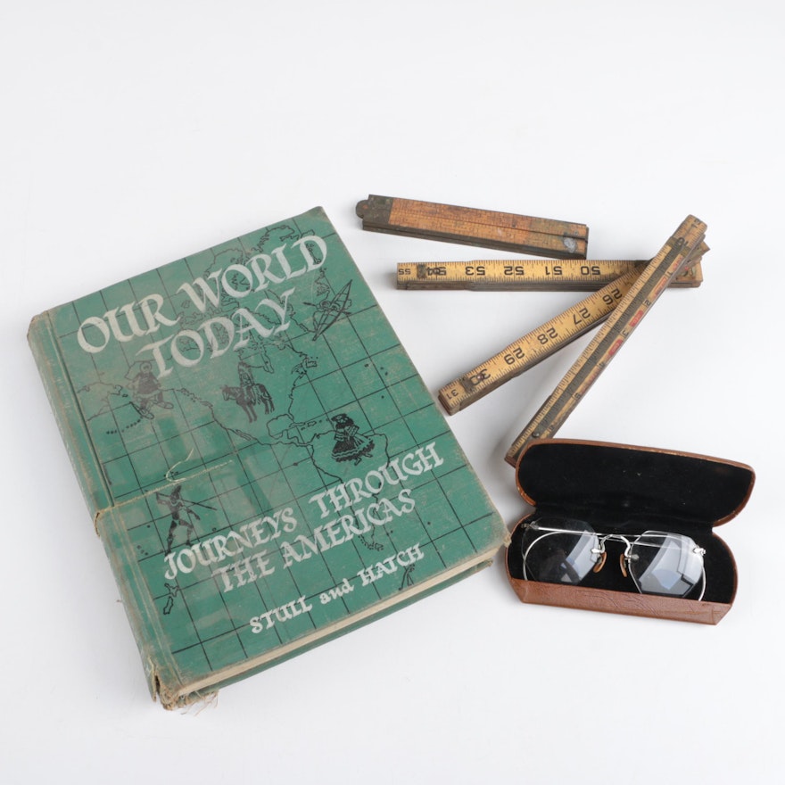 "Our World Today" History Book with Rulers and Spectacles