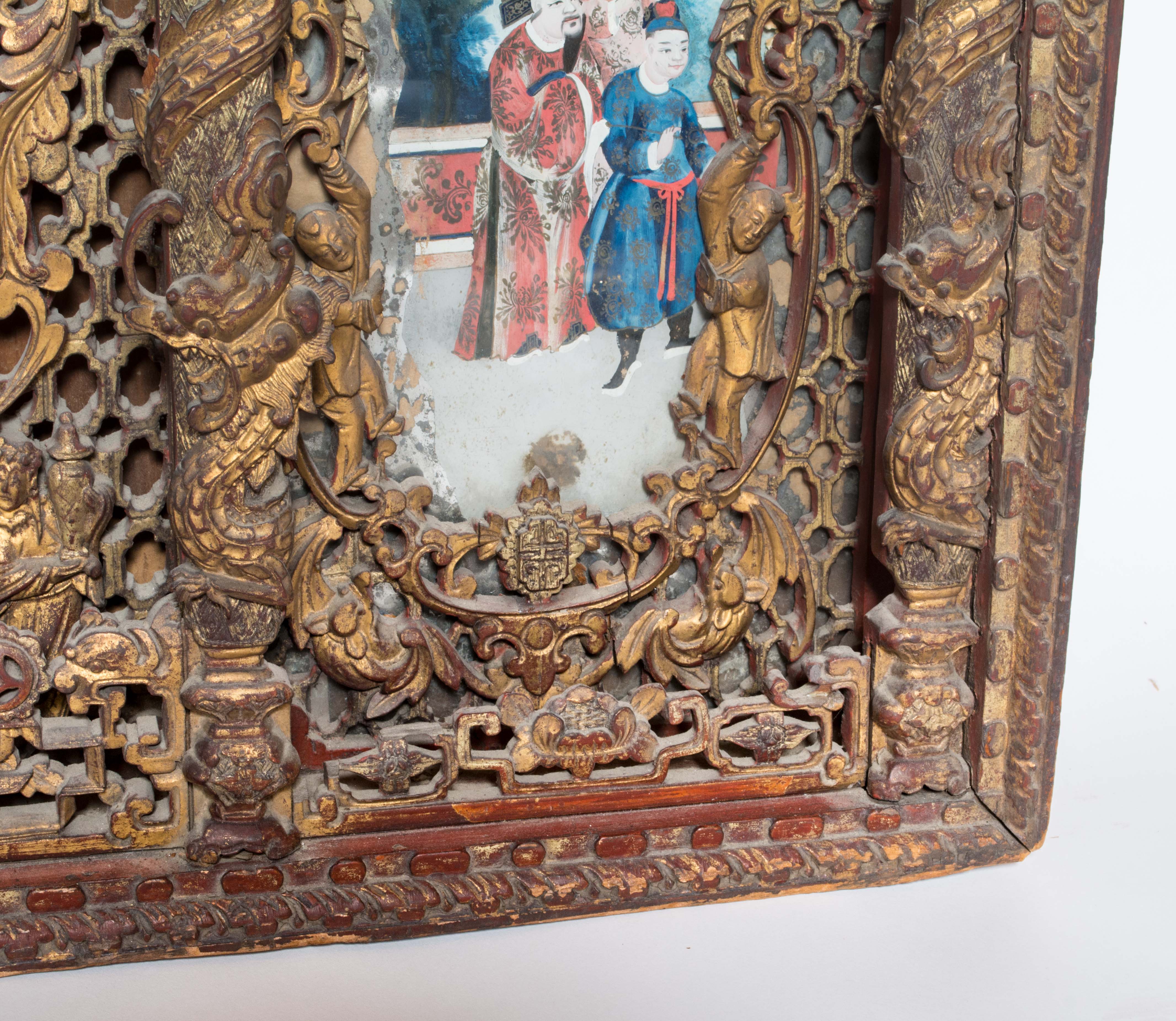 19th Century Chinese Hand Carved and Gilded Mirror with Reverse Painting