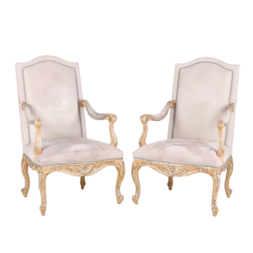 Pair of French Régence Style Arm Chairs