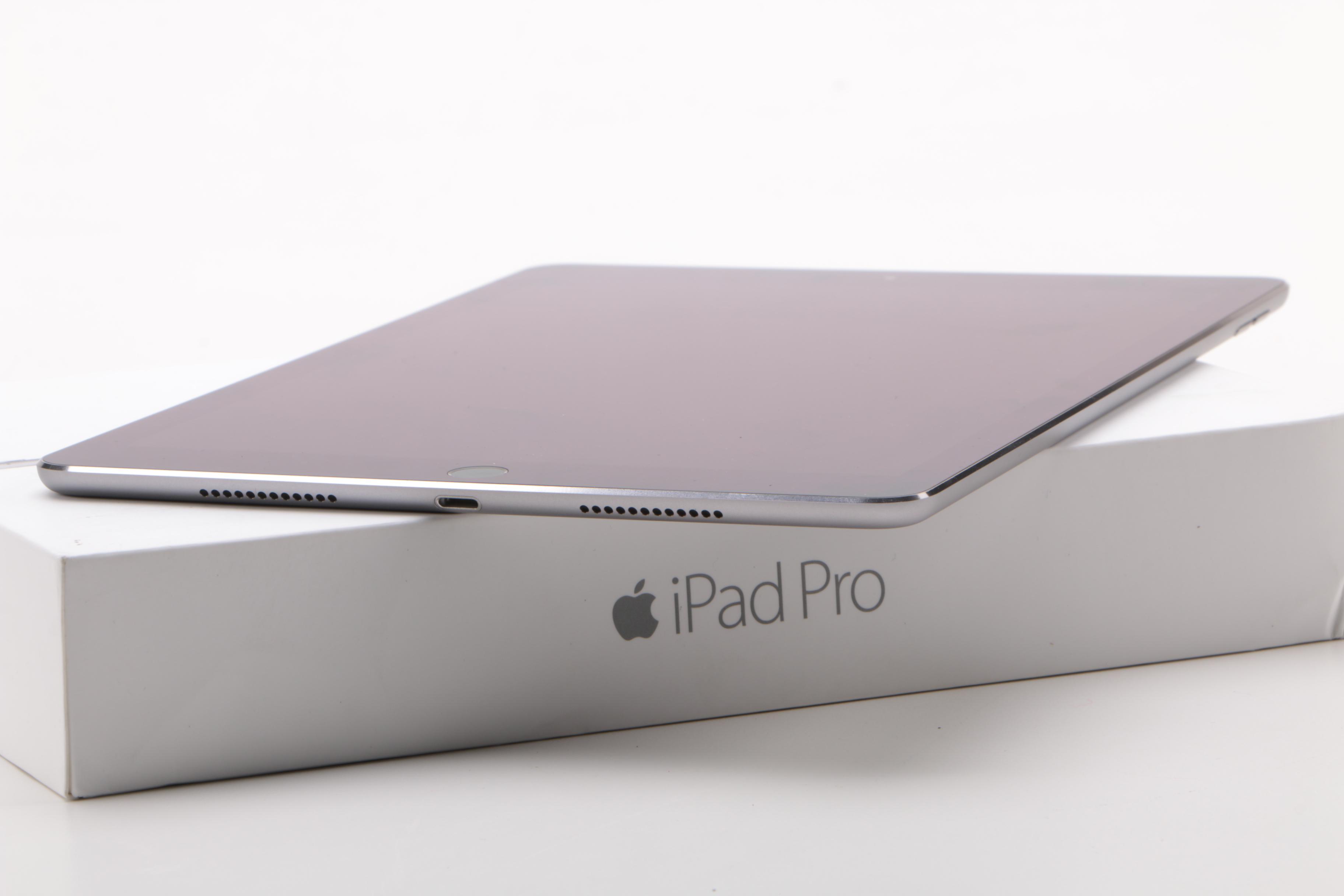 iPad Pro with Packaging and Headphone Splitter