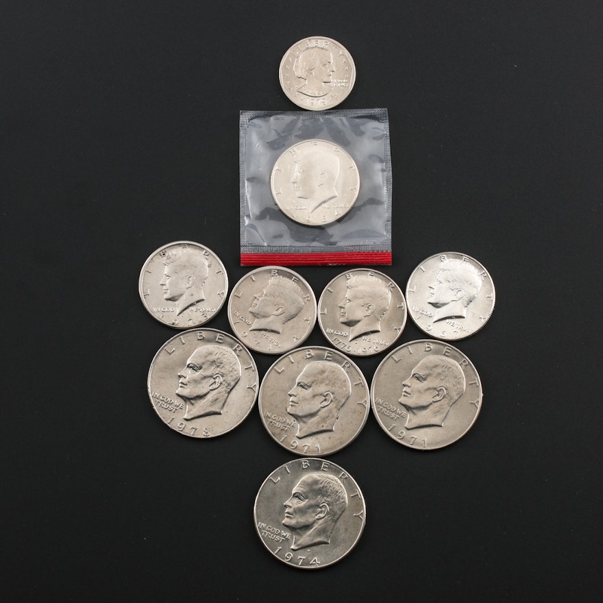 Assortment of U.S. Dollar Coins and Half Dollars