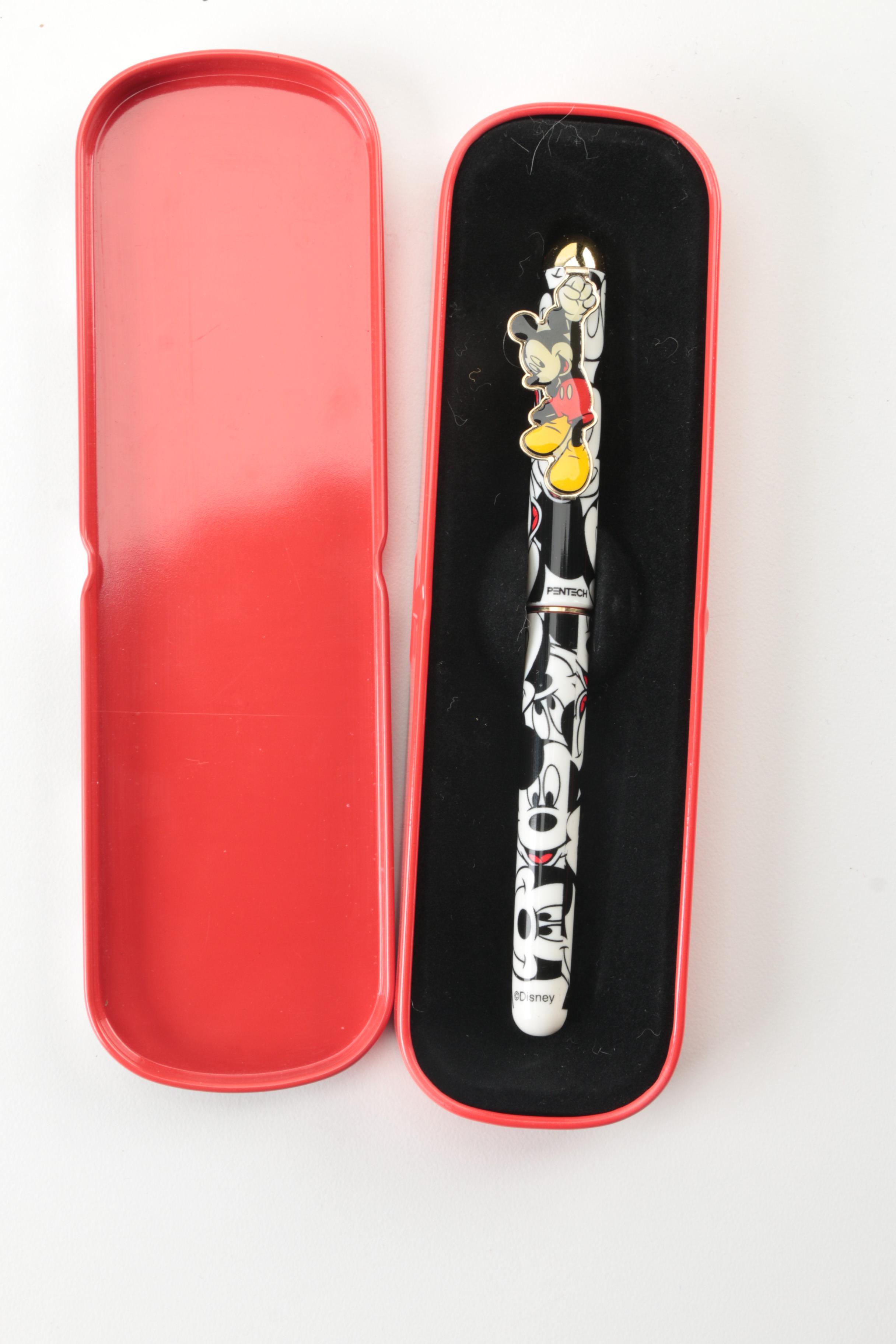 Disney Memorabilia Including Pens, Wall Clock, and More