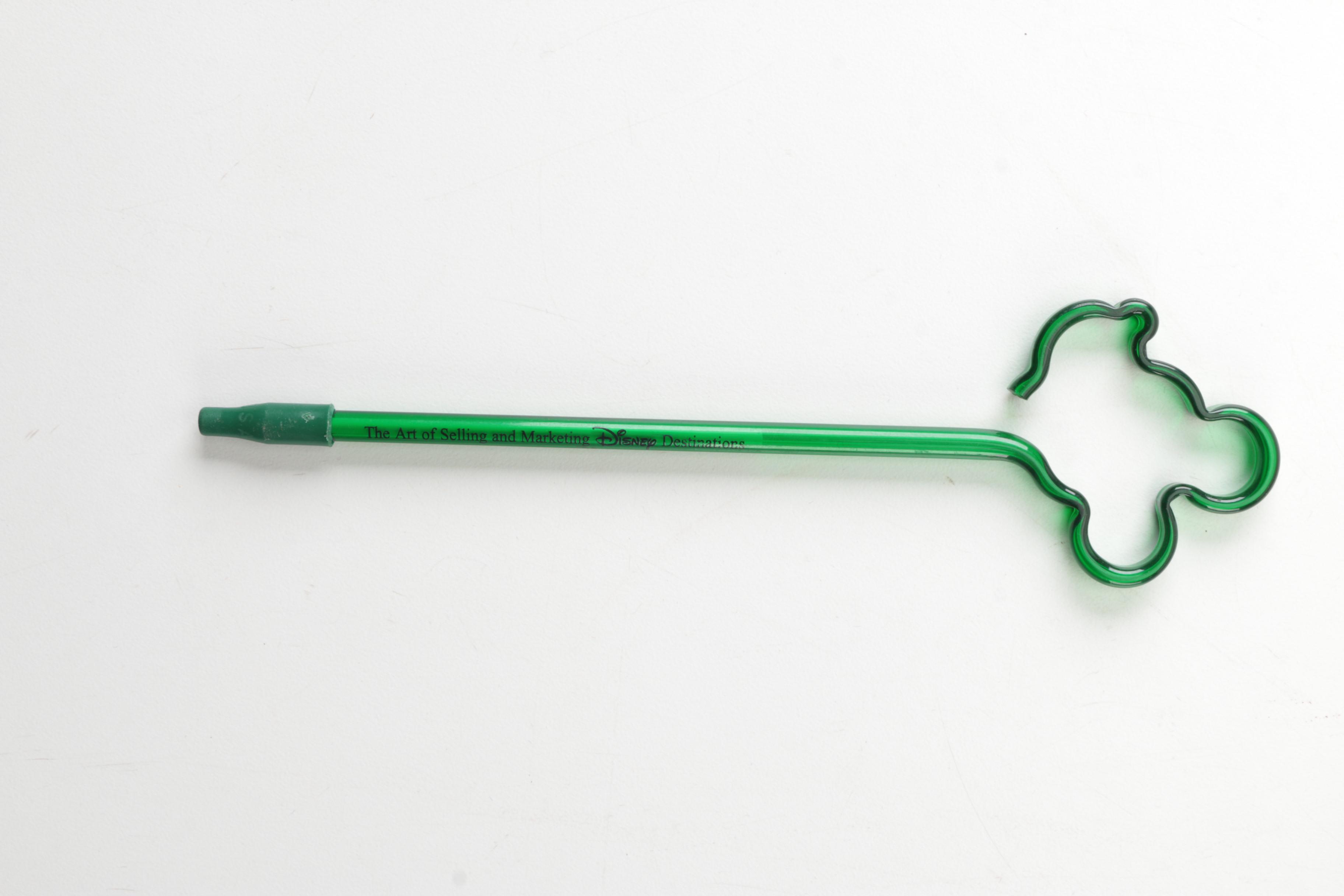 Disney Memorabilia Including Pens, Wall Clock, and More