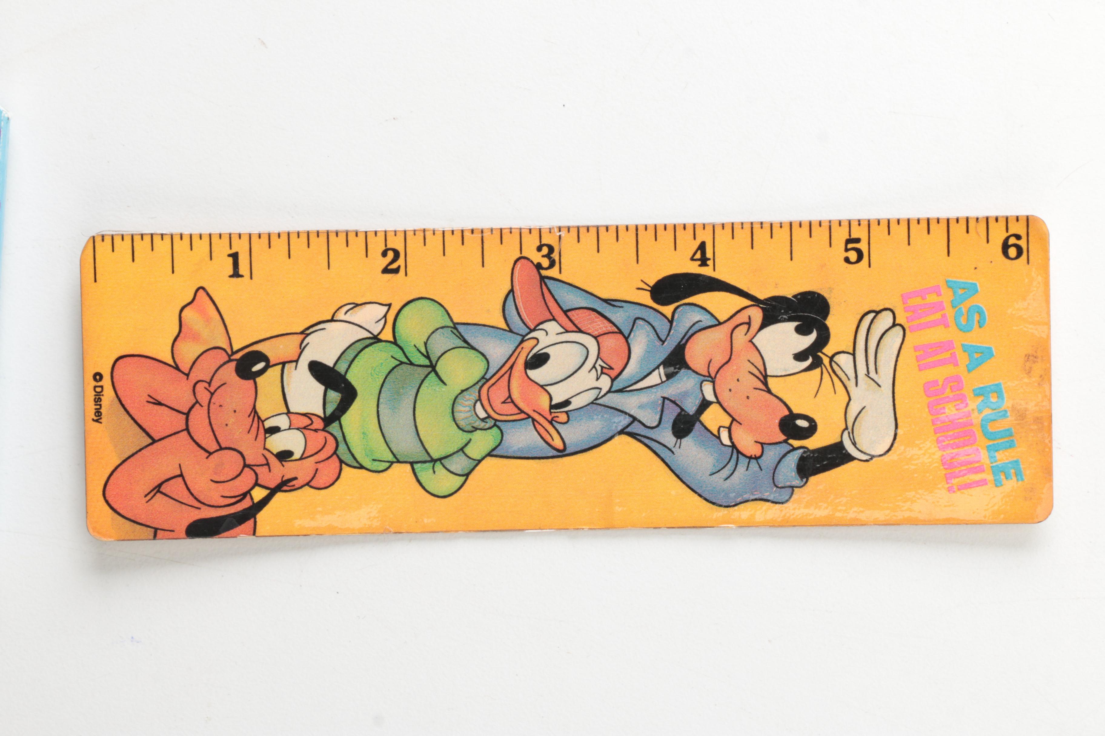 Disney Memorabilia Including Pens, Wall Clock, and More