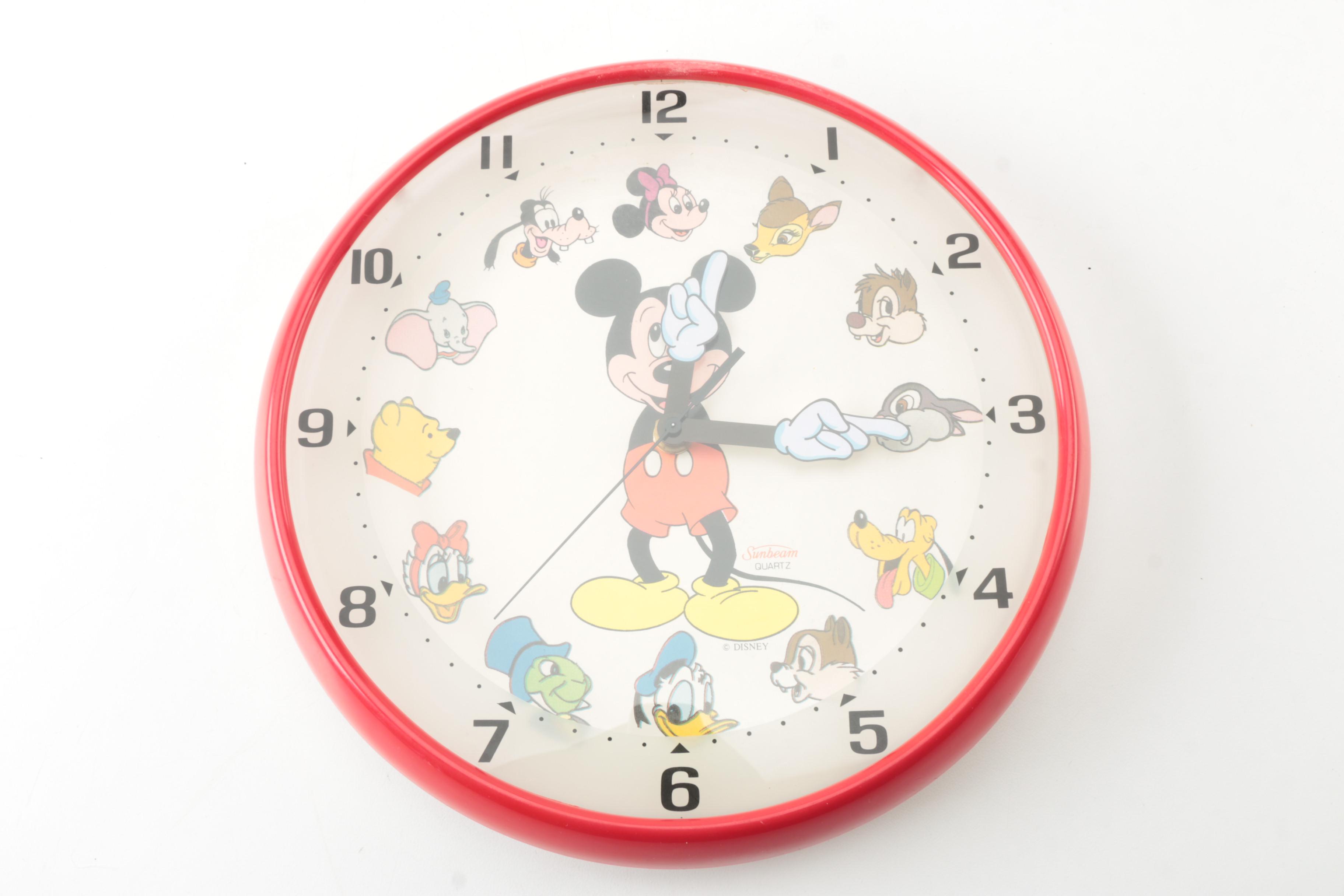 Disney Memorabilia Including Pens, Wall Clock, and More