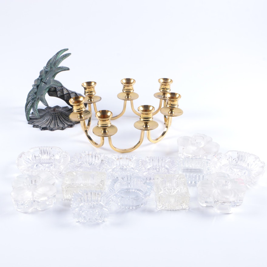 Collection of Glass Votive Holders and Brass Candlestick Holders