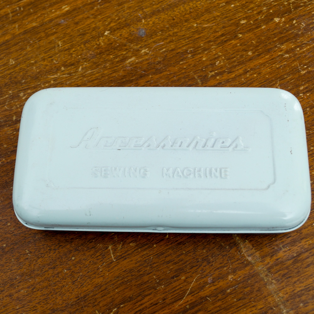 Vintage White Sewing Machine with Cabinet