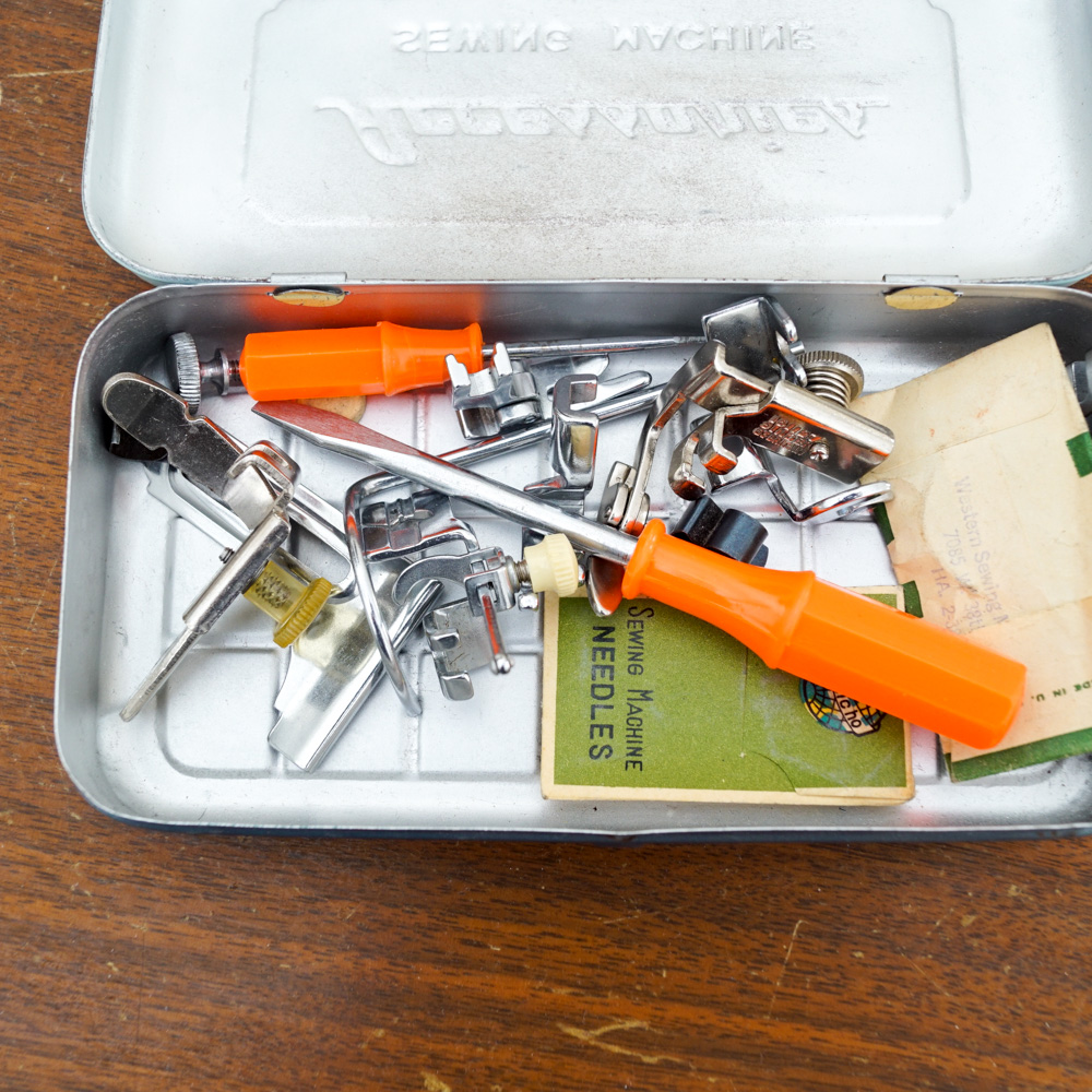 Vintage White Sewing Machine with Cabinet