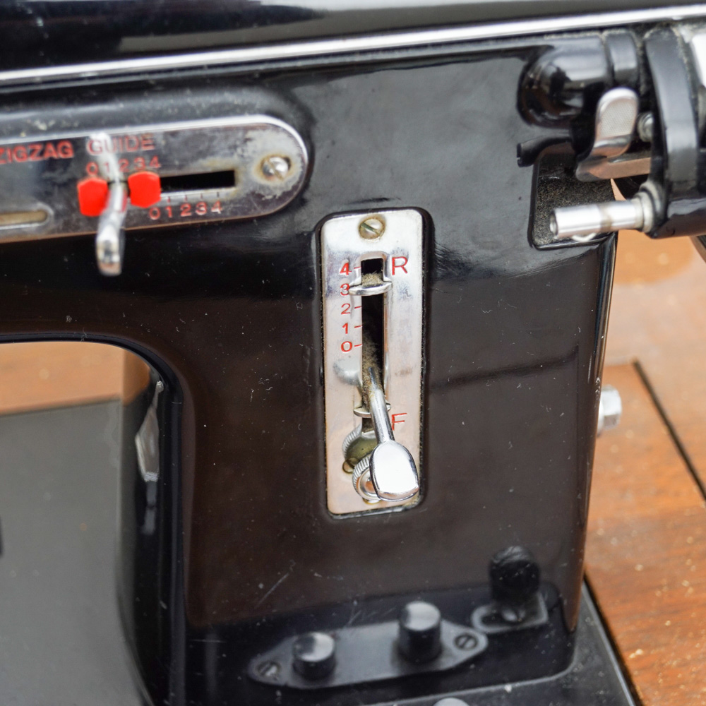 Vintage White Sewing Machine with Cabinet