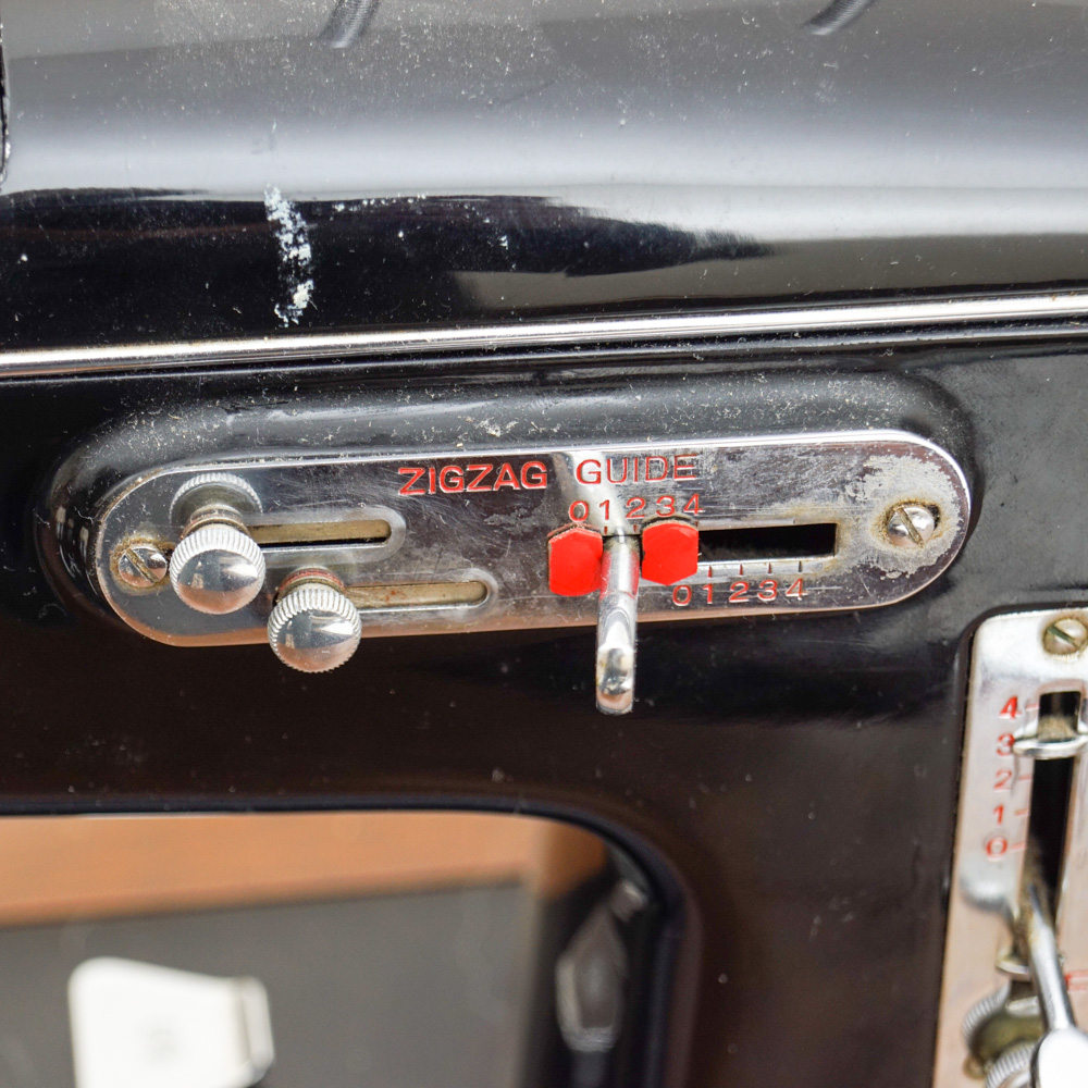 Vintage White Sewing Machine with Cabinet