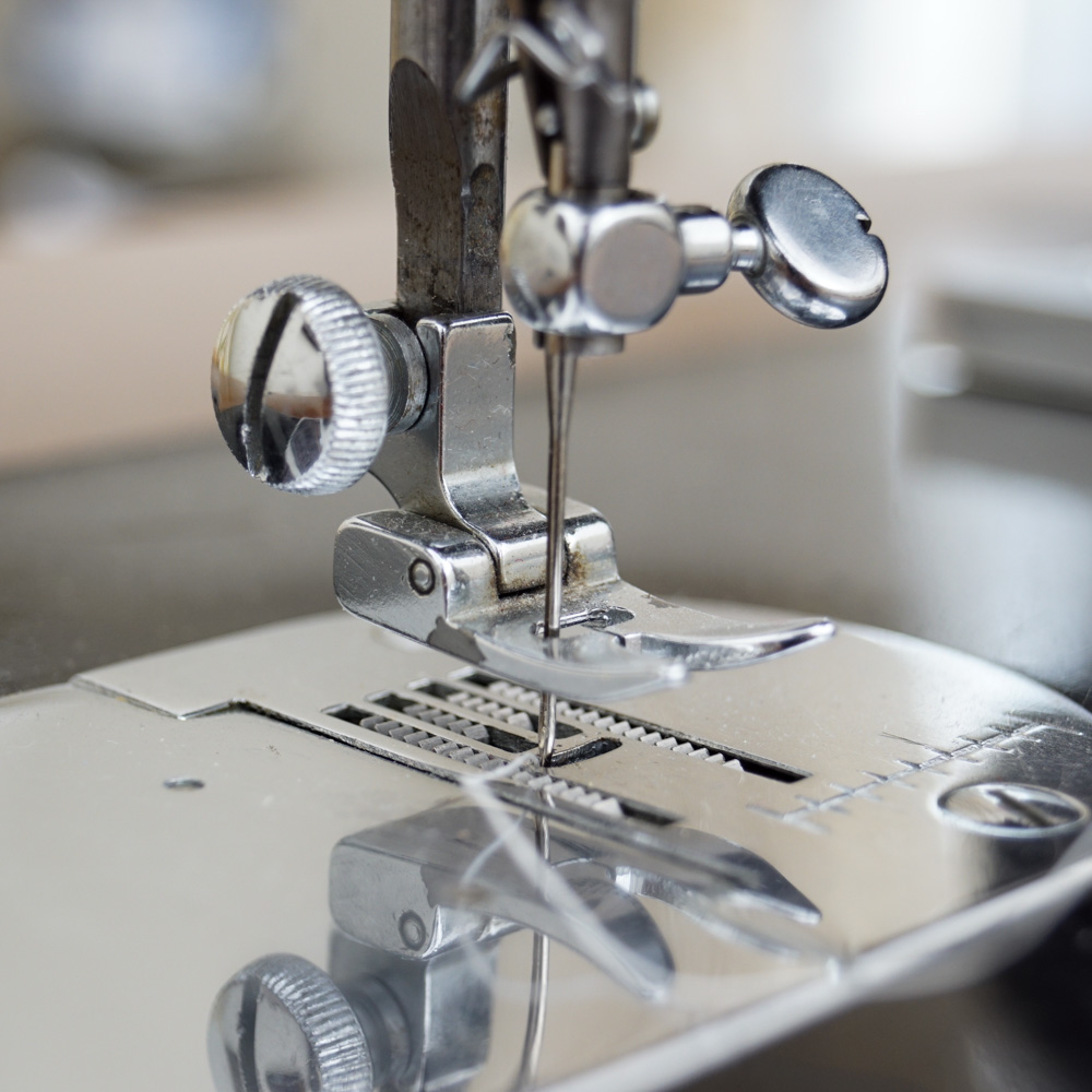 Vintage White Sewing Machine with Cabinet