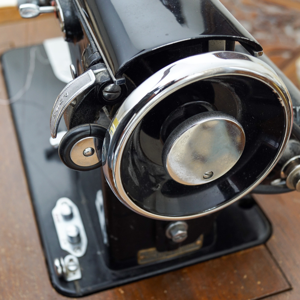 Vintage White Sewing Machine with Cabinet