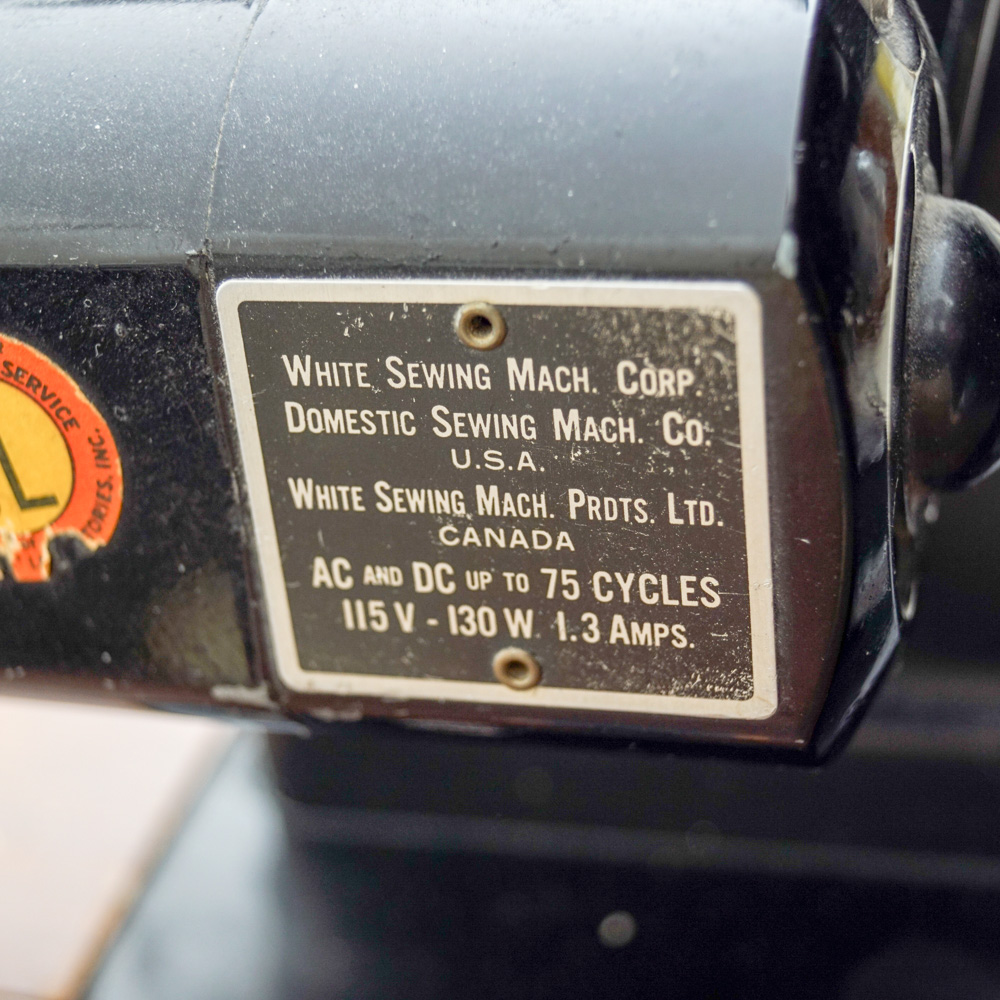 Vintage White Sewing Machine with Cabinet