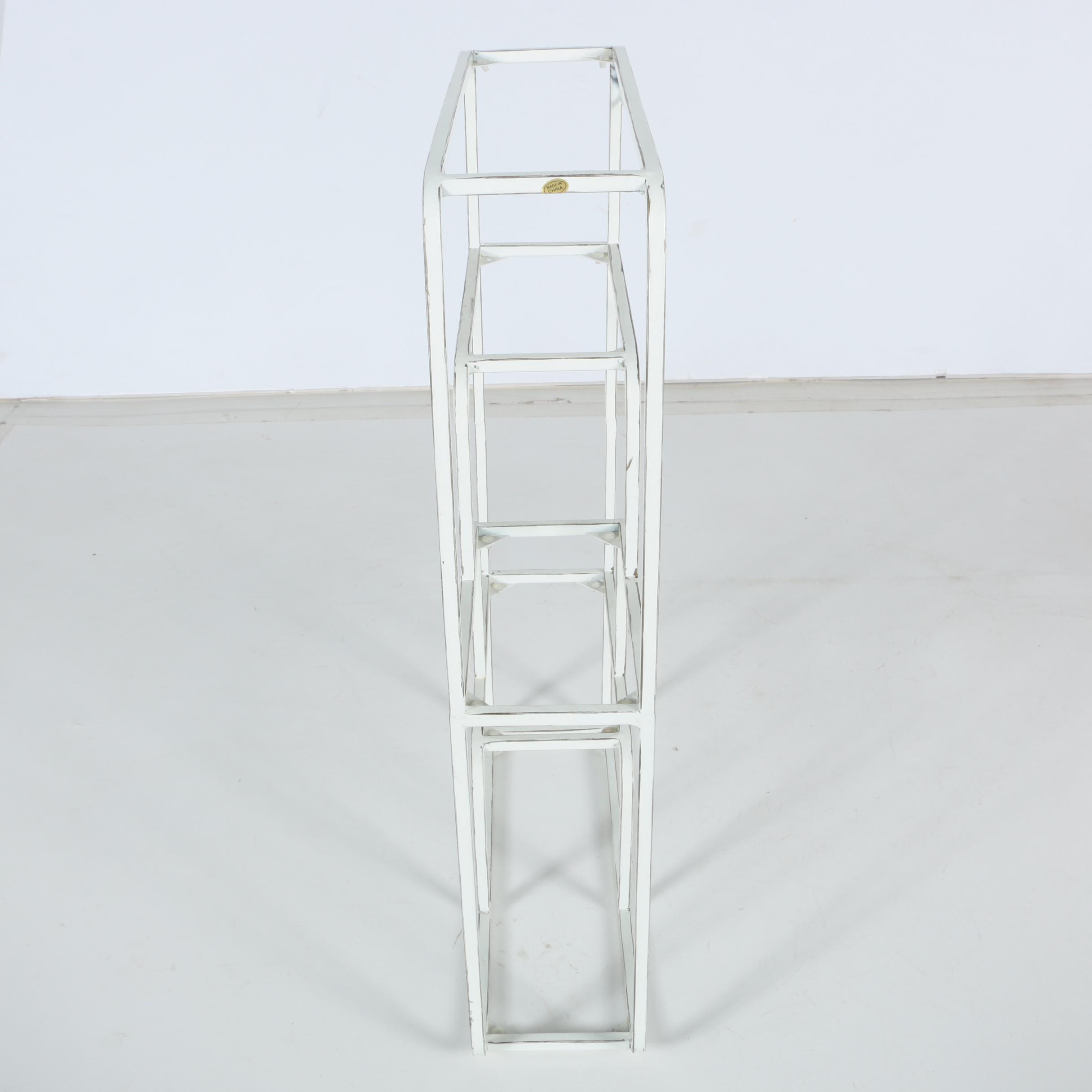 Metal Wall Shelving and Wooden Quilt Rack