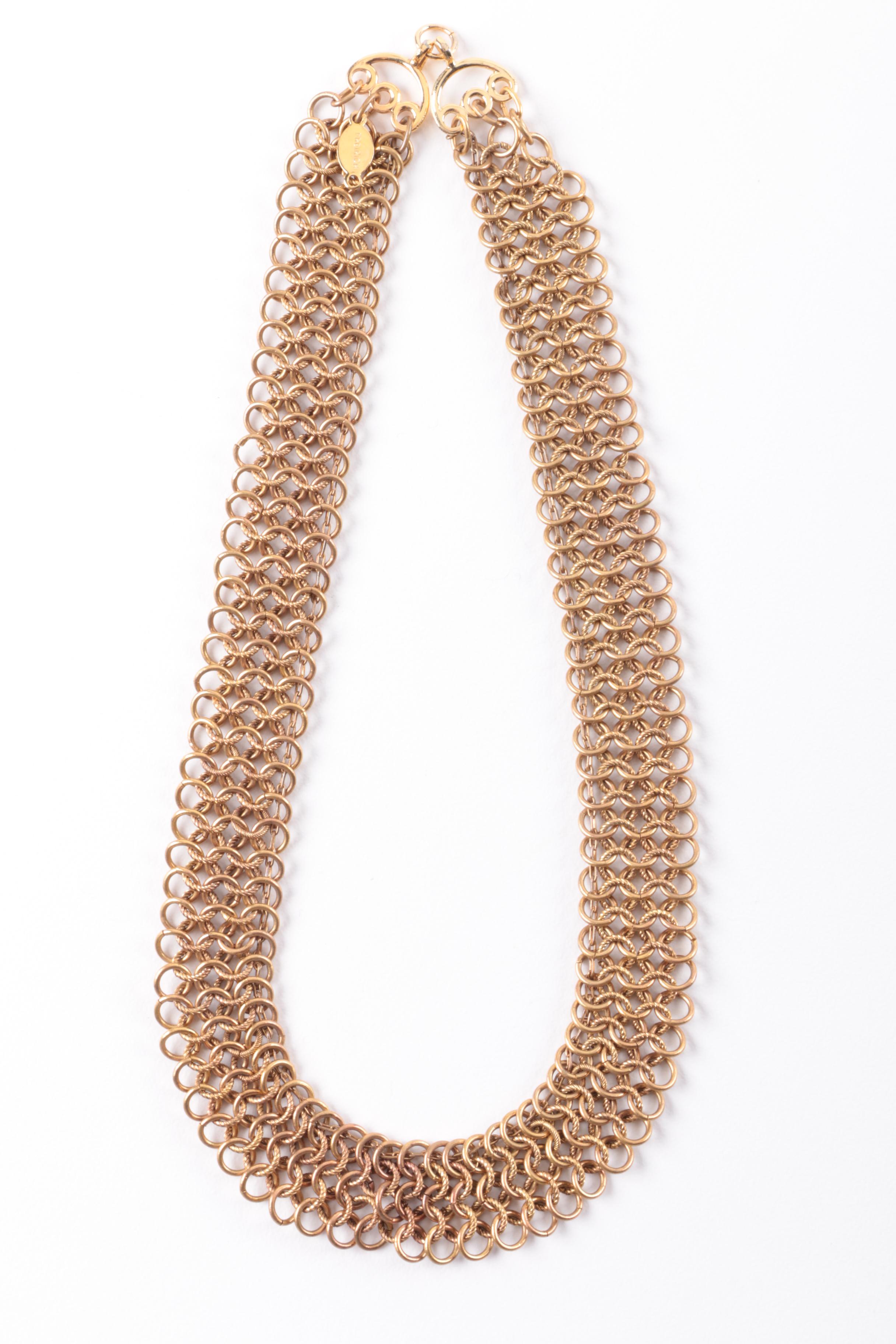 Grouping of Gold Tone Necklaces