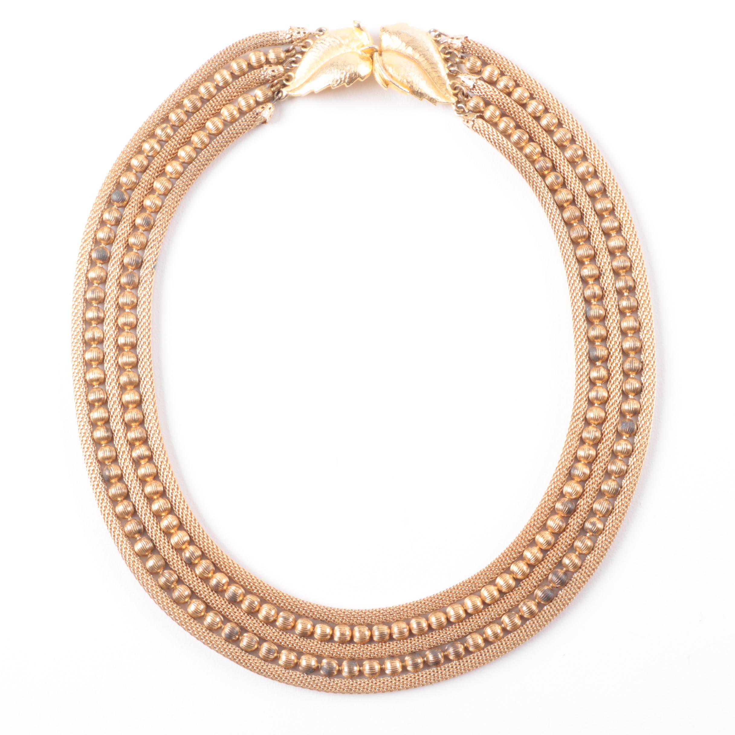 Grouping of Gold Tone Necklaces