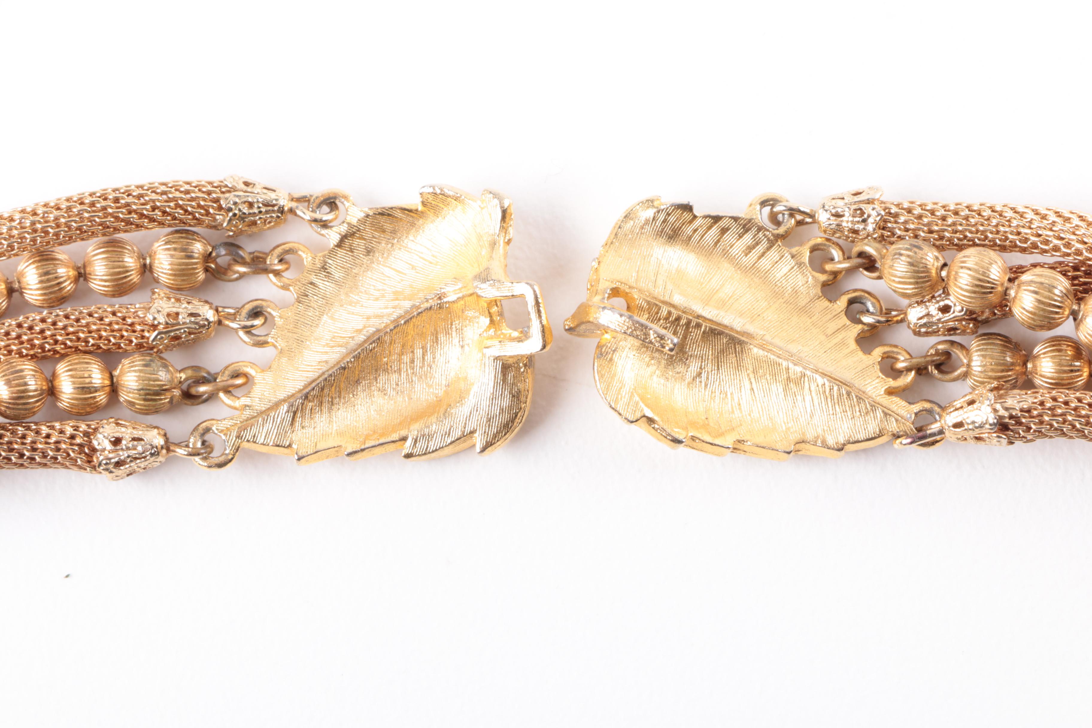 Grouping of Gold Tone Necklaces