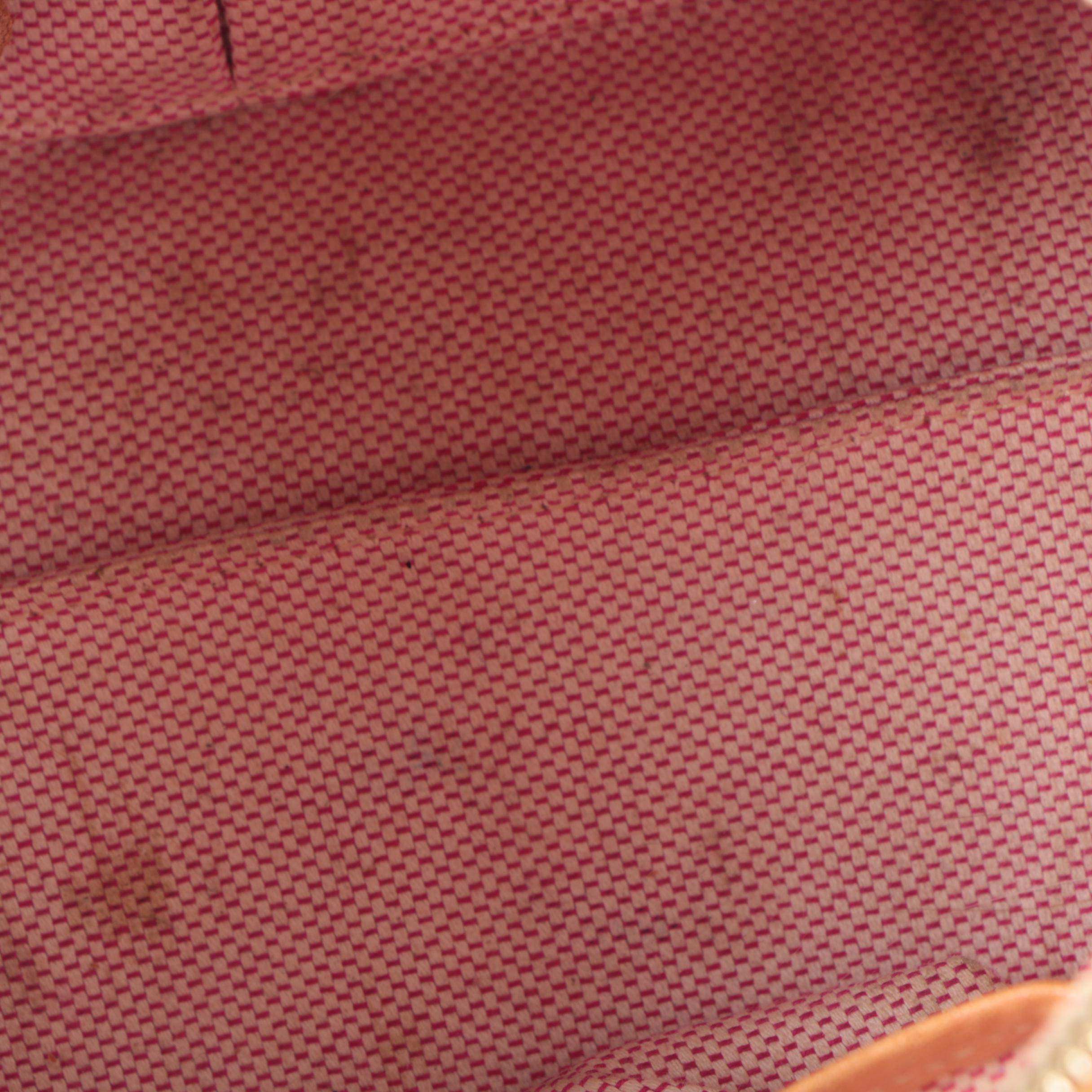 Dooney & Bourke Coated Canvas and Leather Satchel