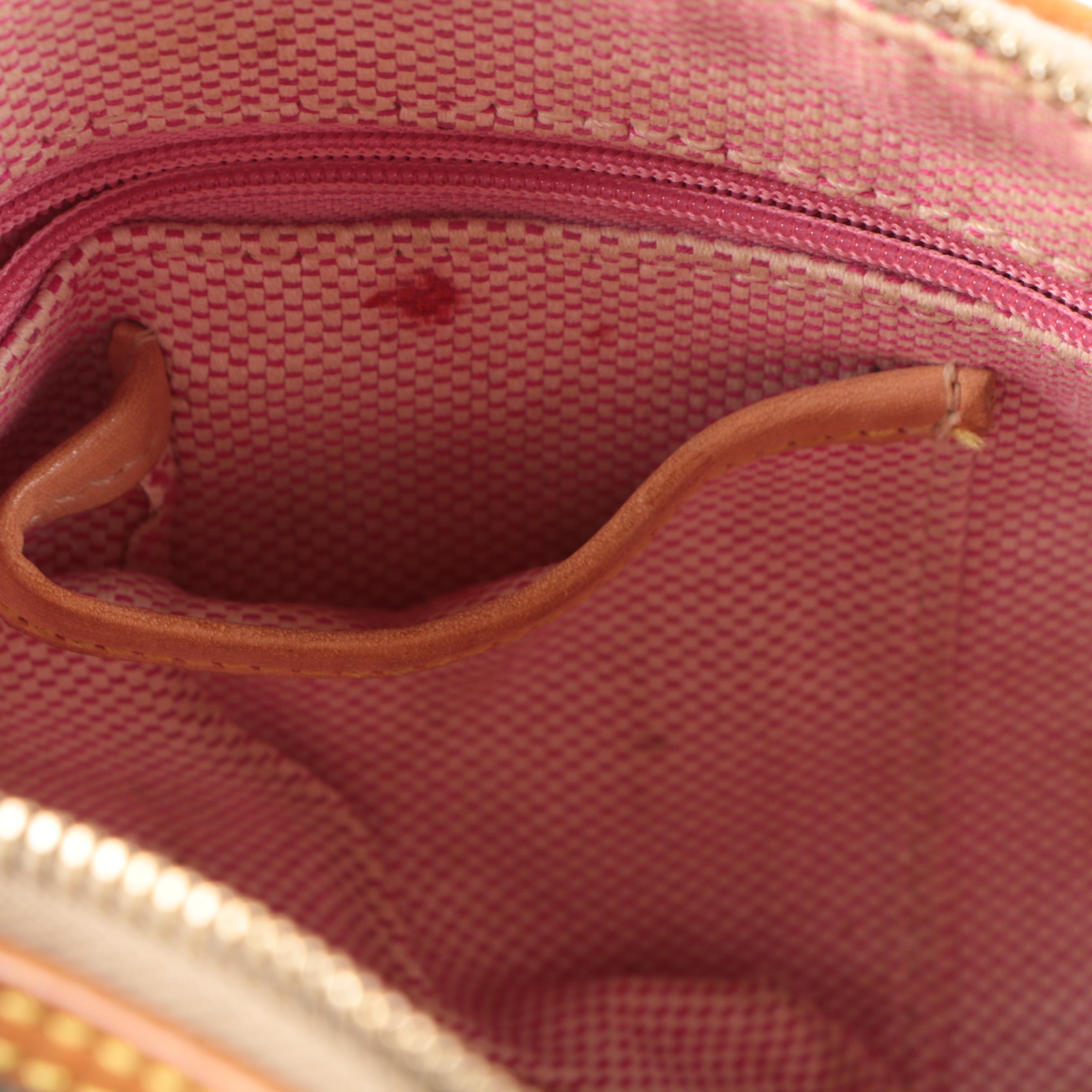 Dooney & Bourke Coated Canvas and Leather Satchel