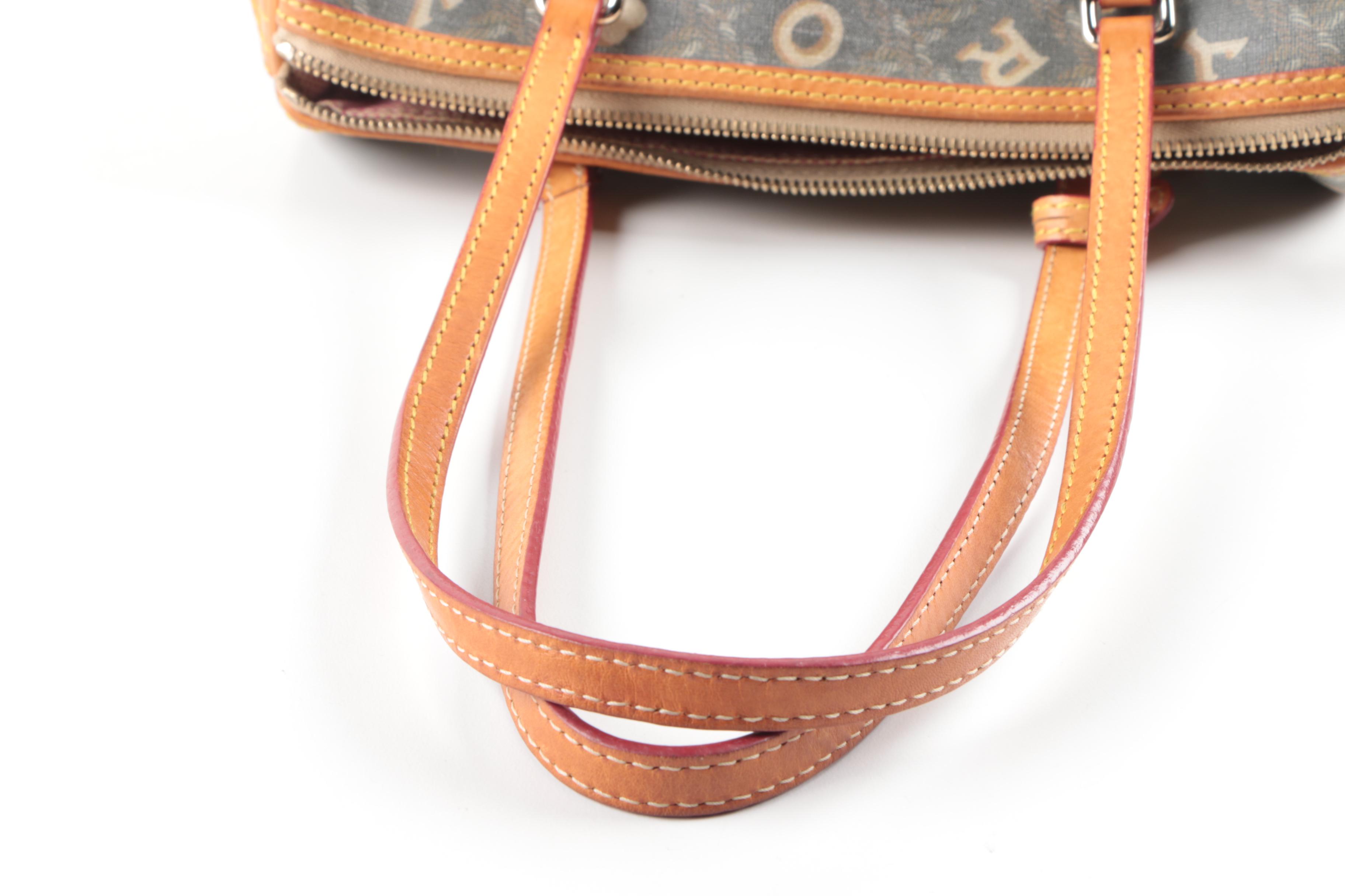 Dooney & Bourke Coated Canvas and Leather Satchel