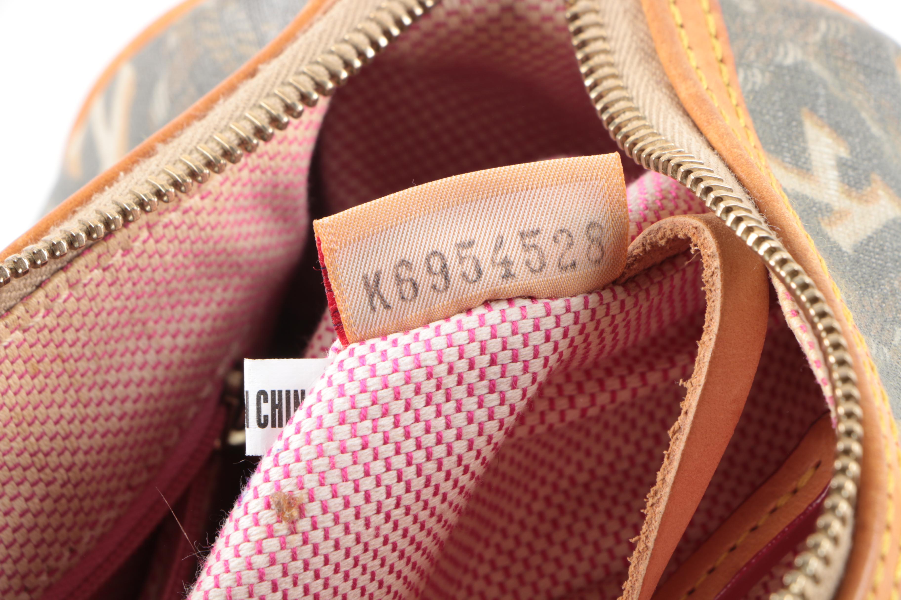 Dooney & Bourke Coated Canvas and Leather Satchel