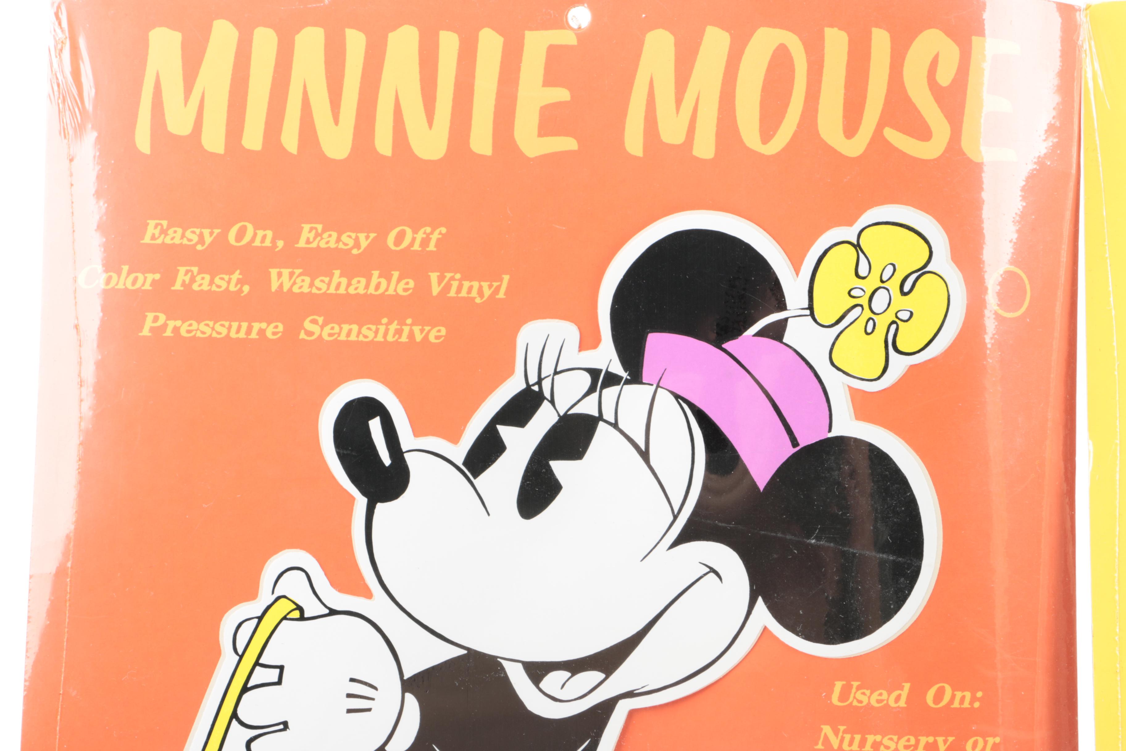 Disney Memorabilia Including Decals, Pencil Sharpener, and More