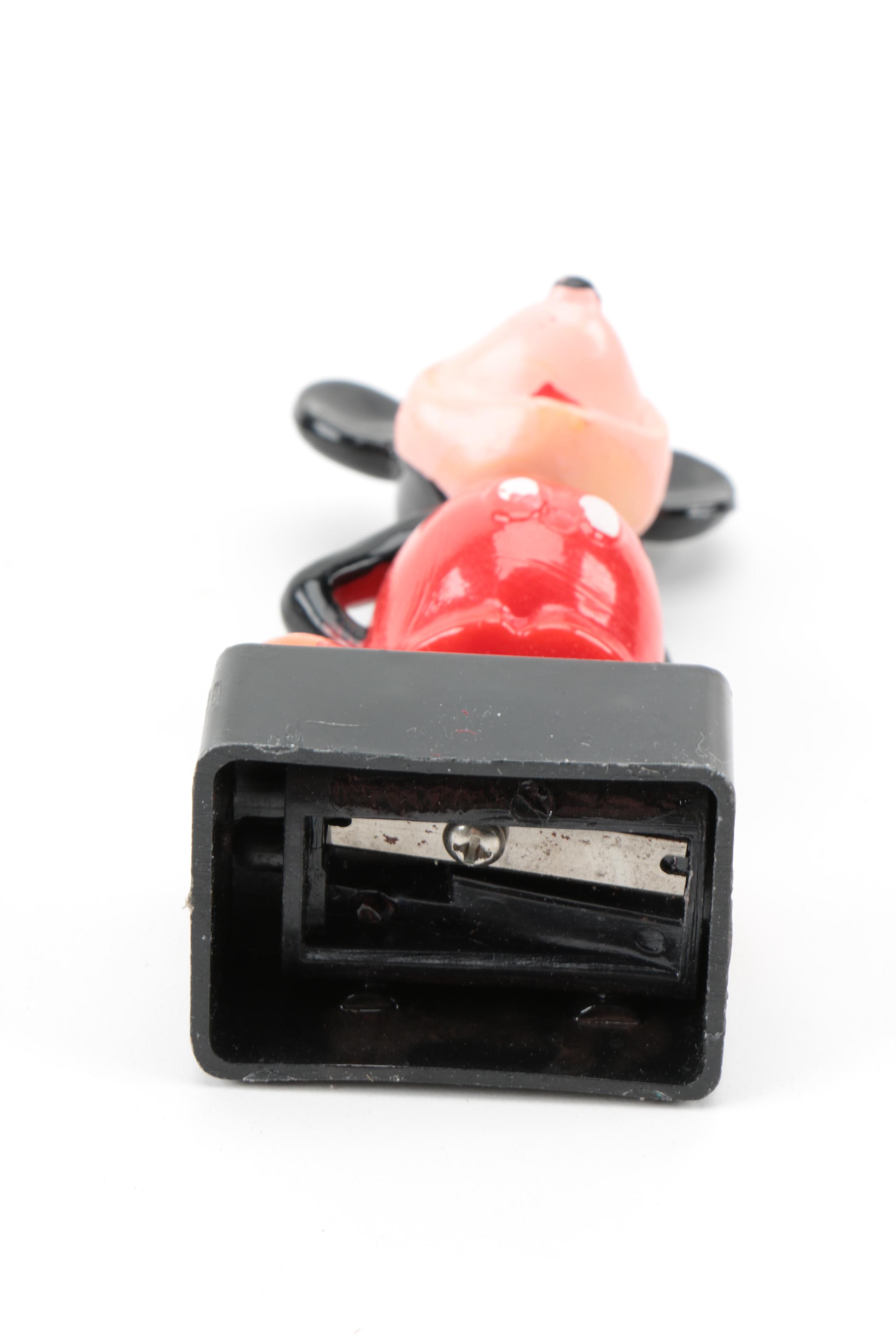 Disney Memorabilia Including Decals, Pencil Sharpener, and More