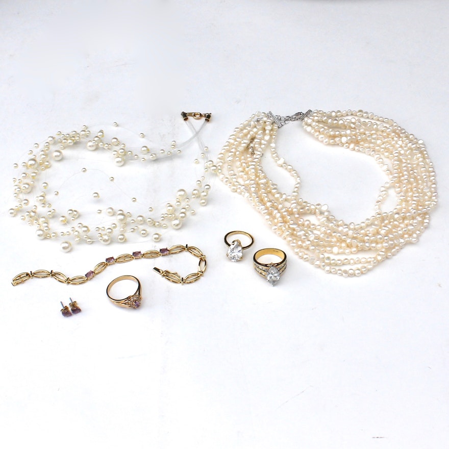 Multi-strand Pearl Necklaces, Statement Cocktail Rings, and Amethyst Jewelry Set