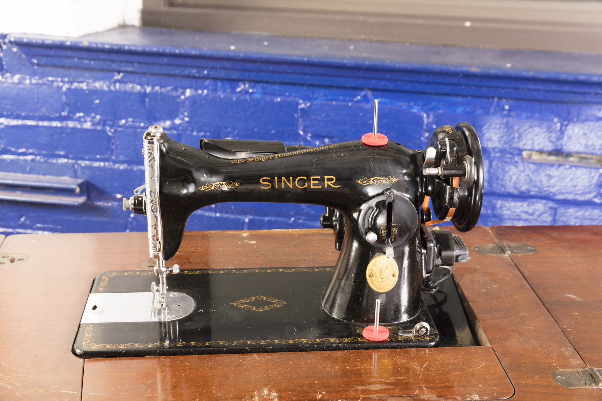 Vintage Singer Sewing Machine with Cabinet and Stool