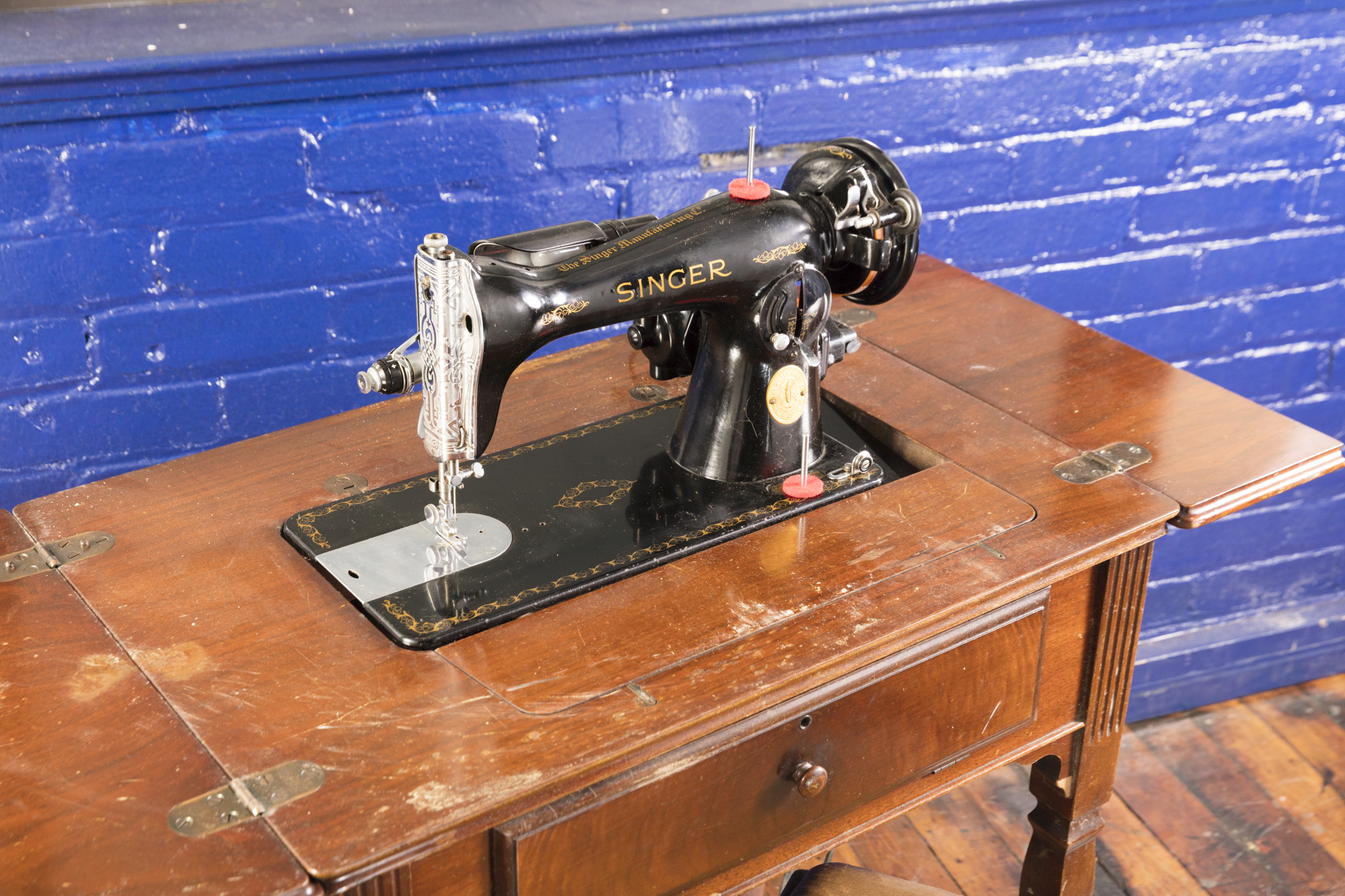 Vintage Singer Sewing Machine with Cabinet and Stool