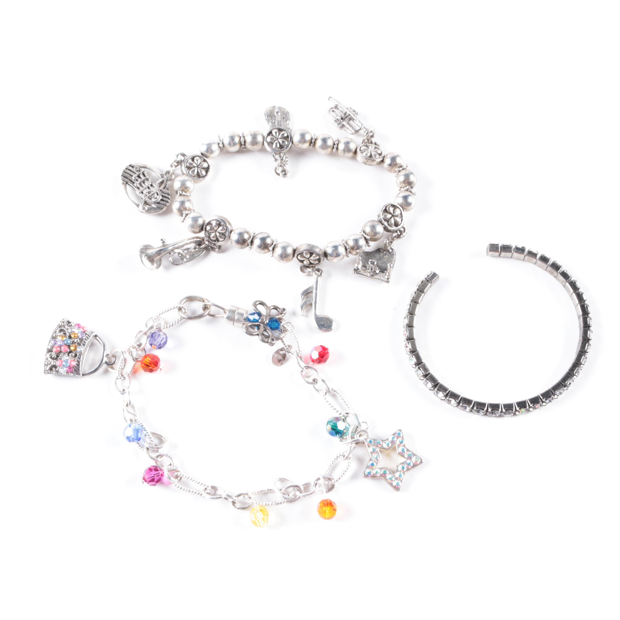 Silver-Toned Costume Bracelets Including a Charm Bracelet