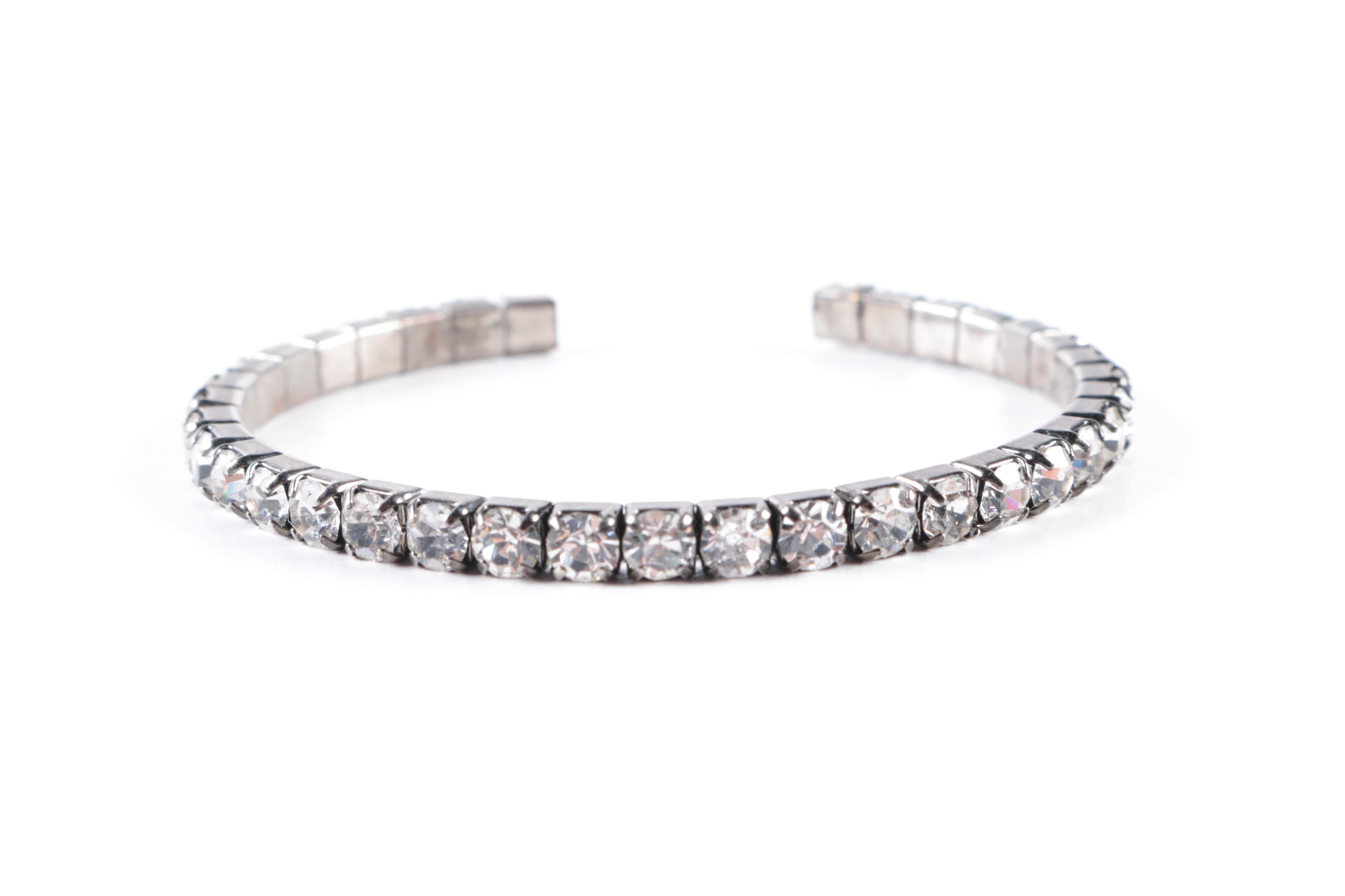 Silver-Toned Costume Bracelets Including a Charm Bracelet