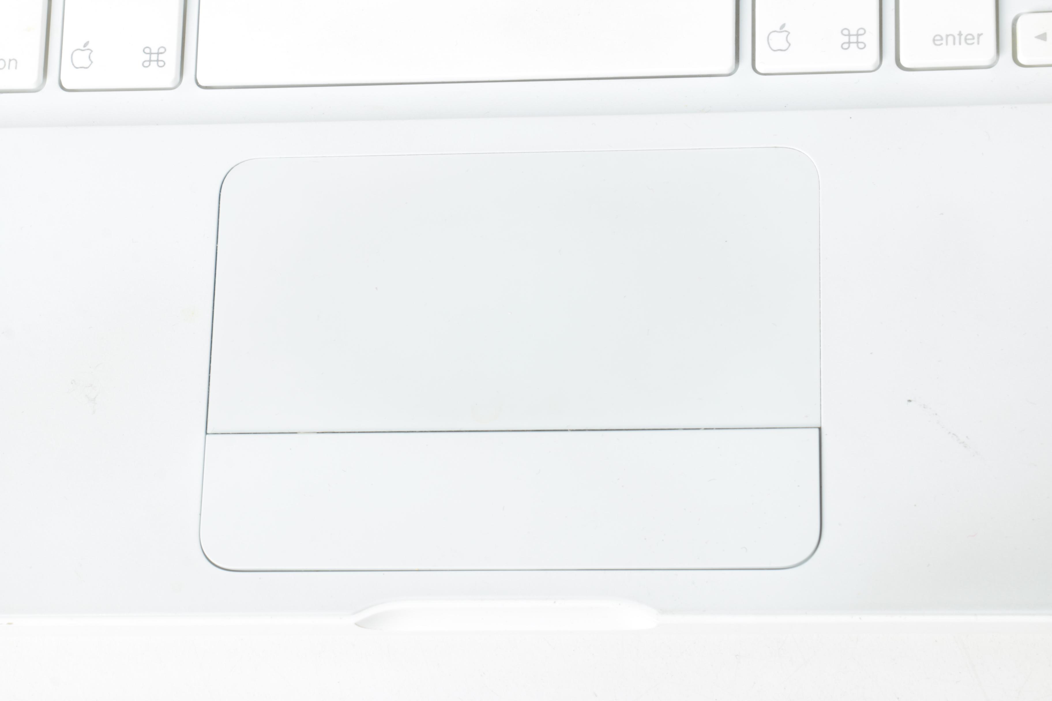 Apple "MacBook" Model "A1181"Laptop Computer And Powerstrip