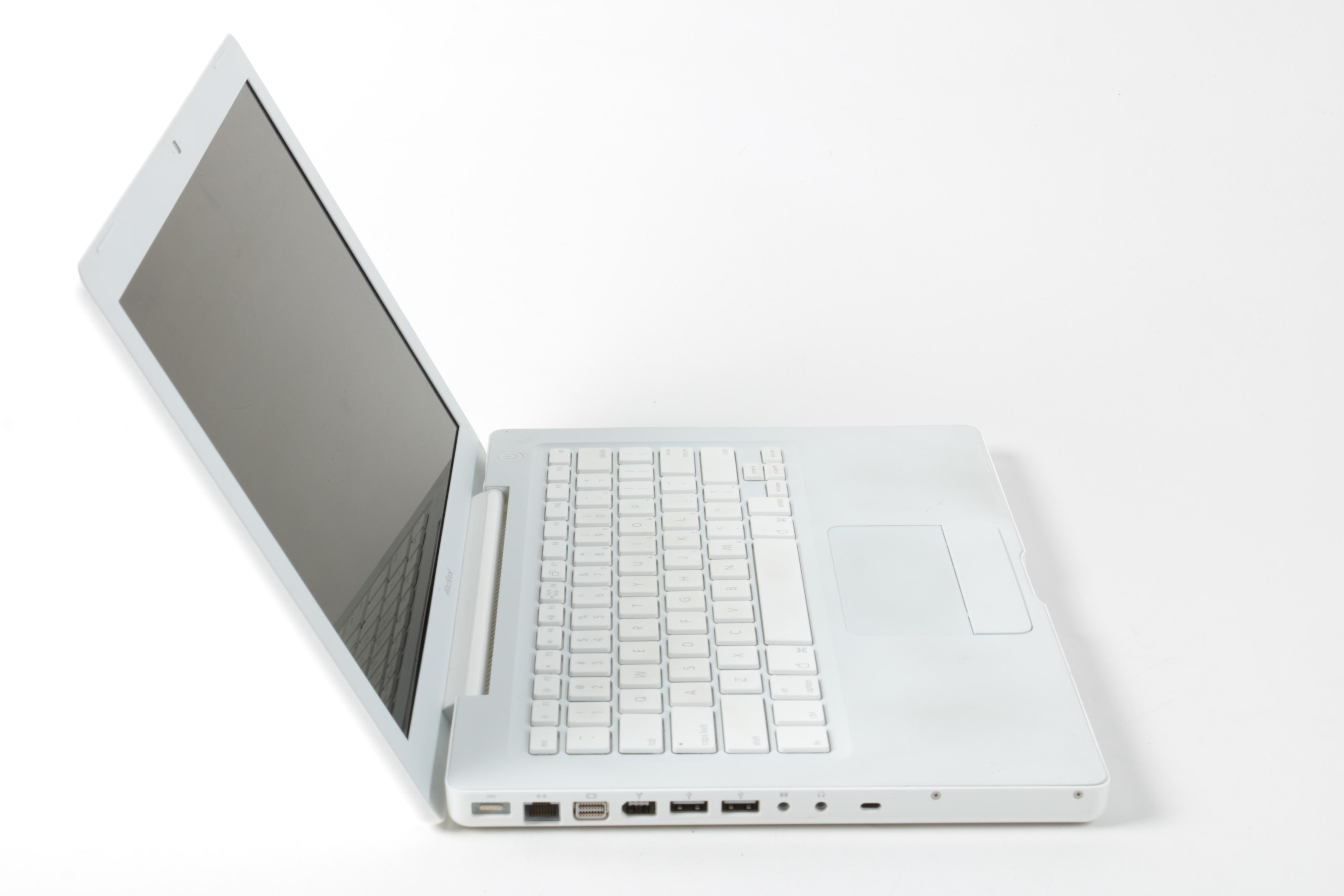 Apple "MacBook" Model "A1181"Laptop Computer And Powerstrip